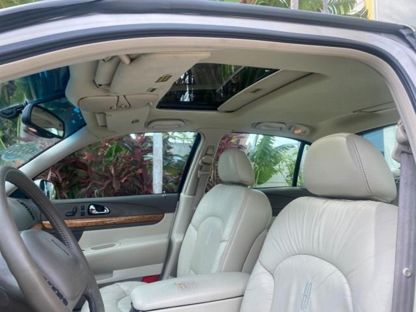 2002 Lt Parchment Gold Metallic /Light Graphite Lincoln Continental LOW MILES 60,071 1 OWNER FLORIDA (1LNHM97V12Y) with an 4.6L DOHC 32-Valve V8 Intech Engine engine, Automatic transmission, located at 4701 North Dixie Hwy, Pompano Beach, FL, 33064, (954) 422-2889, 26.240938, -80.123474 - OUR WEBPAGE FLORIDACARS1.COM HAS OVER 100 PHOTOS AND FREE CARFAX LINK 2002 LINCOLN CONTINENTAL VIN: 1LNHM97V12Y600863 1 L N H M 9 7 V 1 2 Y 6 0 0 8 6 3 SEDAN 4 DR 4.6L V8 F DOHC 32V GASOLINE FRONT WHEEL DRIVE Features ABS Brakes Air Conditioning Alloy Wheels AM/FM Stereo Automatic Transmission Casse - Photo#33
