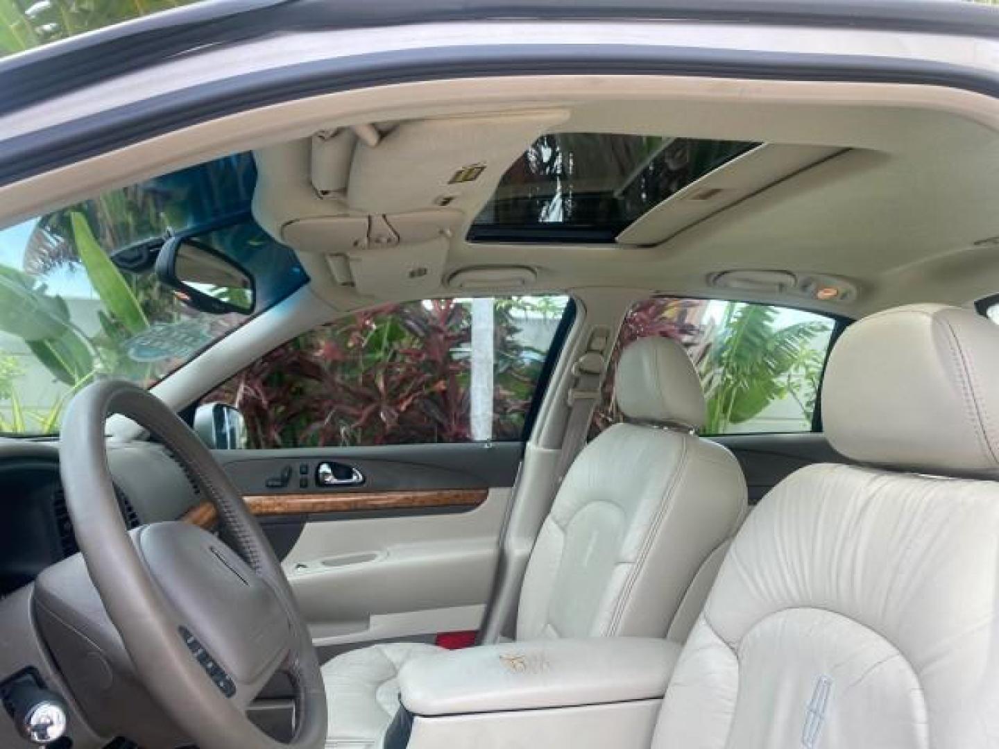 2002 Lt Parchment Gold Metallic /Light Graphite Lincoln Continental LOW MILES 60,071 1 OWNER FLORIDA (1LNHM97V12Y) with an 4.6L DOHC 32-Valve V8 Intech Engine engine, Automatic transmission, located at 4701 North Dixie Hwy, Pompano Beach, FL, 33064, (954) 422-2889, 26.240938, -80.123474 - OUR WEBPAGE FLORIDACARS1.COM HAS OVER 100 PHOTOS AND FREE CARFAX LINK 2002 LINCOLN CONTINENTAL VIN: 1LNHM97V12Y600863 1 L N H M 9 7 V 1 2 Y 6 0 0 8 6 3 SEDAN 4 DR 4.6L V8 F DOHC 32V GASOLINE FRONT WHEEL DRIVE Features ABS Brakes Air Conditioning Alloy Wheels AM/FM Stereo Automatic Transmission Casse - Photo#34