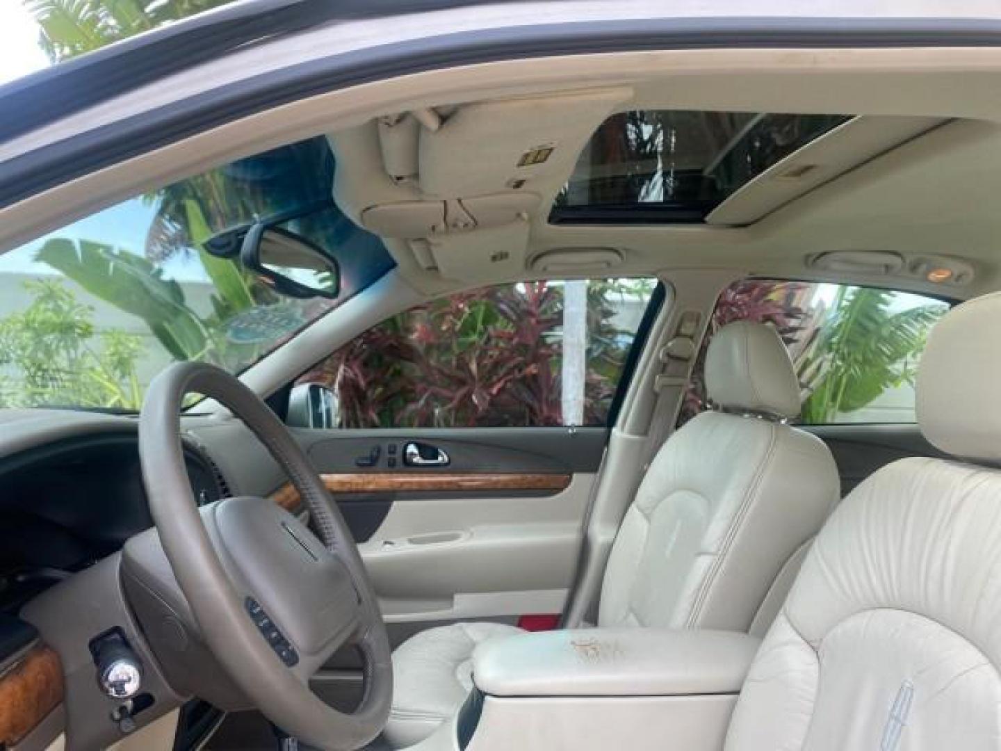 2002 Lt Parchment Gold Metallic /Light Graphite Lincoln Continental LOW MILES 60,071 1 OWNER FLORIDA (1LNHM97V12Y) with an 4.6L DOHC 32-Valve V8 Intech Engine engine, Automatic transmission, located at 4701 North Dixie Hwy, Pompano Beach, FL, 33064, (954) 422-2889, 26.240938, -80.123474 - OUR WEBPAGE FLORIDACARS1.COM HAS OVER 100 PHOTOS AND FREE CARFAX LINK 2002 LINCOLN CONTINENTAL VIN: 1LNHM97V12Y600863 1 L N H M 9 7 V 1 2 Y 6 0 0 8 6 3 SEDAN 4 DR 4.6L V8 F DOHC 32V GASOLINE FRONT WHEEL DRIVE Features ABS Brakes Air Conditioning Alloy Wheels AM/FM Stereo Automatic Transmission Casse - Photo#35