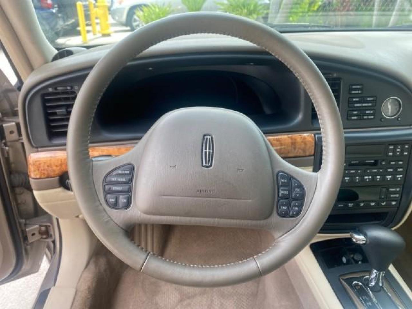 2002 Lt Parchment Gold Metallic /Light Graphite Lincoln Continental LOW MILES 60,071 1 OWNER FLORIDA (1LNHM97V12Y) with an 4.6L DOHC 32-Valve V8 Intech Engine engine, Automatic transmission, located at 4701 North Dixie Hwy, Pompano Beach, FL, 33064, (954) 422-2889, 26.240938, -80.123474 - OUR WEBPAGE FLORIDACARS1.COM HAS OVER 100 PHOTOS AND FREE CARFAX LINK 2002 LINCOLN CONTINENTAL VIN: 1LNHM97V12Y600863 1 L N H M 9 7 V 1 2 Y 6 0 0 8 6 3 SEDAN 4 DR 4.6L V8 F DOHC 32V GASOLINE FRONT WHEEL DRIVE Features ABS Brakes Air Conditioning Alloy Wheels AM/FM Stereo Automatic Transmission Casse - Photo#38