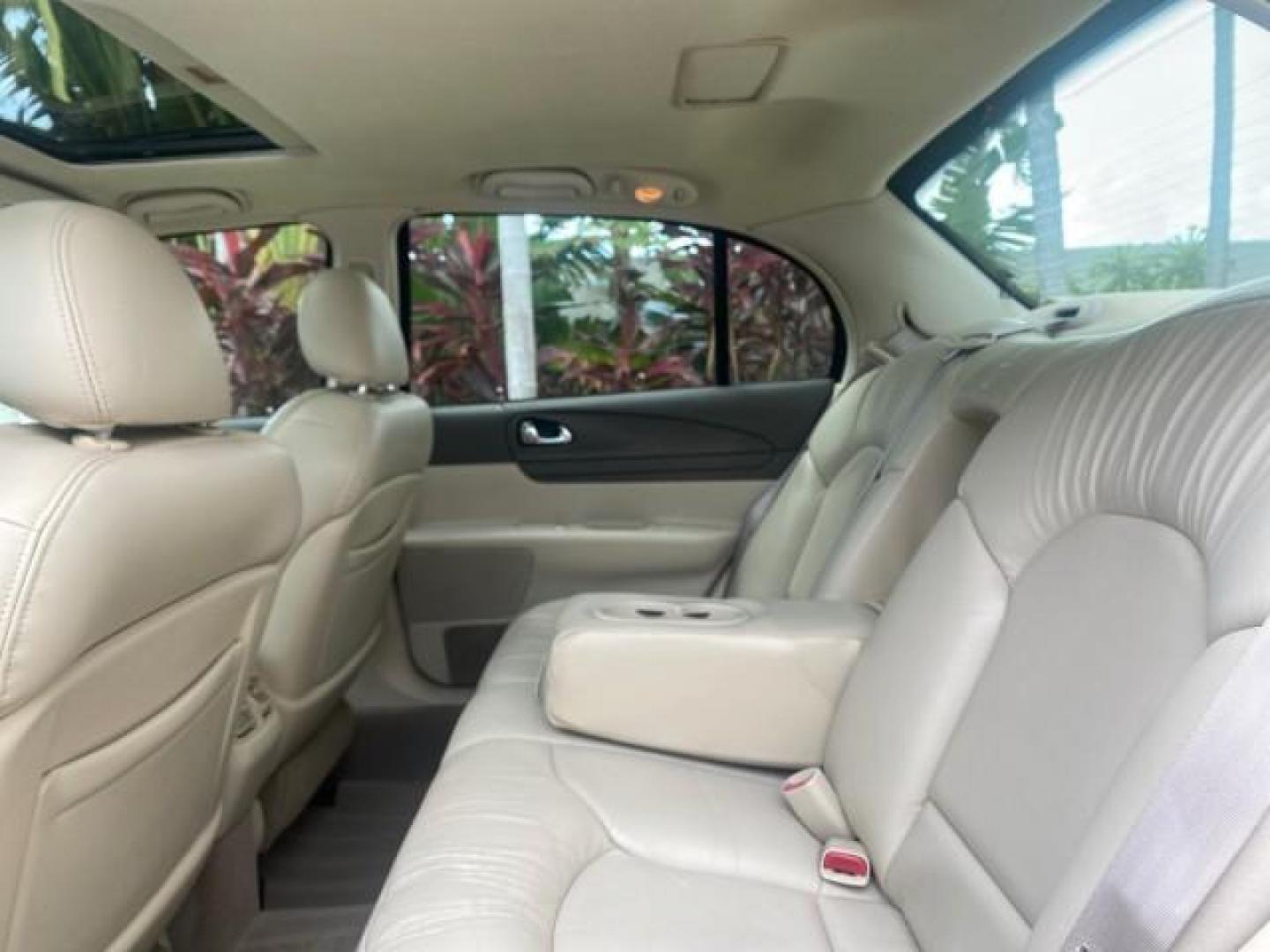 2002 Lt Parchment Gold Metallic /Light Graphite Lincoln Continental LOW MILES 60,071 1 OWNER FLORIDA (1LNHM97V12Y) with an 4.6L DOHC 32-Valve V8 Intech Engine engine, Automatic transmission, located at 4701 North Dixie Hwy, Pompano Beach, FL, 33064, (954) 422-2889, 26.240938, -80.123474 - OUR WEBPAGE FLORIDACARS1.COM HAS OVER 100 PHOTOS AND FREE CARFAX LINK 2002 LINCOLN CONTINENTAL VIN: 1LNHM97V12Y600863 1 L N H M 9 7 V 1 2 Y 6 0 0 8 6 3 SEDAN 4 DR 4.6L V8 F DOHC 32V GASOLINE FRONT WHEEL DRIVE Features ABS Brakes Air Conditioning Alloy Wheels AM/FM Stereo Automatic Transmission Casse - Photo#64