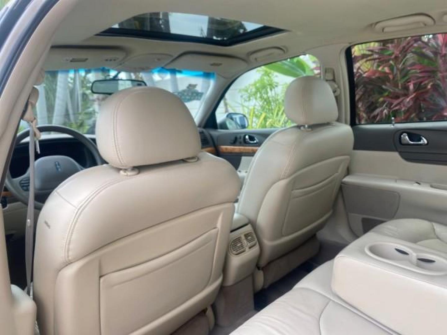 2002 Lt Parchment Gold Metallic /Light Graphite Lincoln Continental LOW MILES 60,071 1 OWNER FLORIDA (1LNHM97V12Y) with an 4.6L DOHC 32-Valve V8 Intech Engine engine, Automatic transmission, located at 4701 North Dixie Hwy, Pompano Beach, FL, 33064, (954) 422-2889, 26.240938, -80.123474 - OUR WEBPAGE FLORIDACARS1.COM HAS OVER 100 PHOTOS AND FREE CARFAX LINK 2002 LINCOLN CONTINENTAL VIN: 1LNHM97V12Y600863 1 L N H M 9 7 V 1 2 Y 6 0 0 8 6 3 SEDAN 4 DR 4.6L V8 F DOHC 32V GASOLINE FRONT WHEEL DRIVE Features ABS Brakes Air Conditioning Alloy Wheels AM/FM Stereo Automatic Transmission Casse - Photo#67