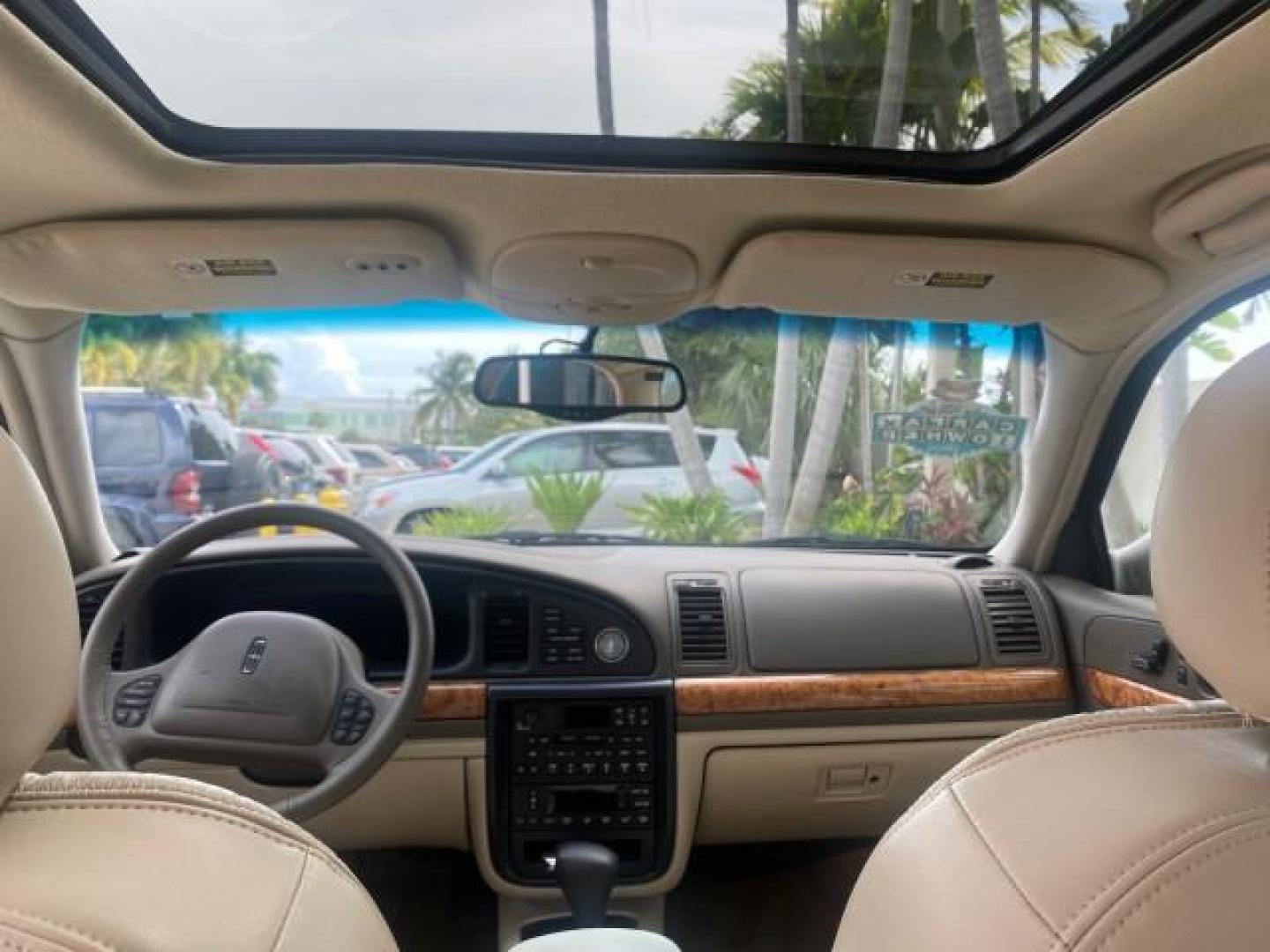 2002 Lt Parchment Gold Metallic /Light Graphite Lincoln Continental LOW MILES 60,071 1 OWNER FLORIDA (1LNHM97V12Y) with an 4.6L DOHC 32-Valve V8 Intech Engine engine, Automatic transmission, located at 4701 North Dixie Hwy, Pompano Beach, FL, 33064, (954) 422-2889, 26.240938, -80.123474 - OUR WEBPAGE FLORIDACARS1.COM HAS OVER 100 PHOTOS AND FREE CARFAX LINK 2002 LINCOLN CONTINENTAL VIN: 1LNHM97V12Y600863 1 L N H M 9 7 V 1 2 Y 6 0 0 8 6 3 SEDAN 4 DR 4.6L V8 F DOHC 32V GASOLINE FRONT WHEEL DRIVE Features ABS Brakes Air Conditioning Alloy Wheels AM/FM Stereo Automatic Transmission Casse - Photo#69