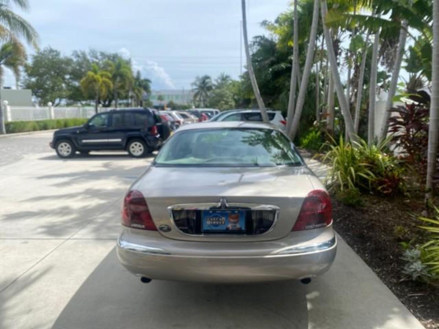 2002 Lt Parchment Gold Metallic /Light Graphite Lincoln Continental LOW MILES 60,071 1 OWNER FLORIDA (1LNHM97V12Y) with an 4.6L DOHC 32-Valve V8 Intech Engine engine, Automatic transmission, located at 4701 North Dixie Hwy, Pompano Beach, FL, 33064, (954) 422-2889, 26.240938, -80.123474 - OUR WEBPAGE FLORIDACARS1.COM HAS OVER 100 PHOTOS AND FREE CARFAX LINK 2002 LINCOLN CONTINENTAL VIN: 1LNHM97V12Y600863 1 L N H M 9 7 V 1 2 Y 6 0 0 8 6 3 SEDAN 4 DR 4.6L V8 F DOHC 32V GASOLINE FRONT WHEEL DRIVE Features ABS Brakes Air Conditioning Alloy Wheels AM/FM Stereo Automatic Transmission Casse - Photo#76