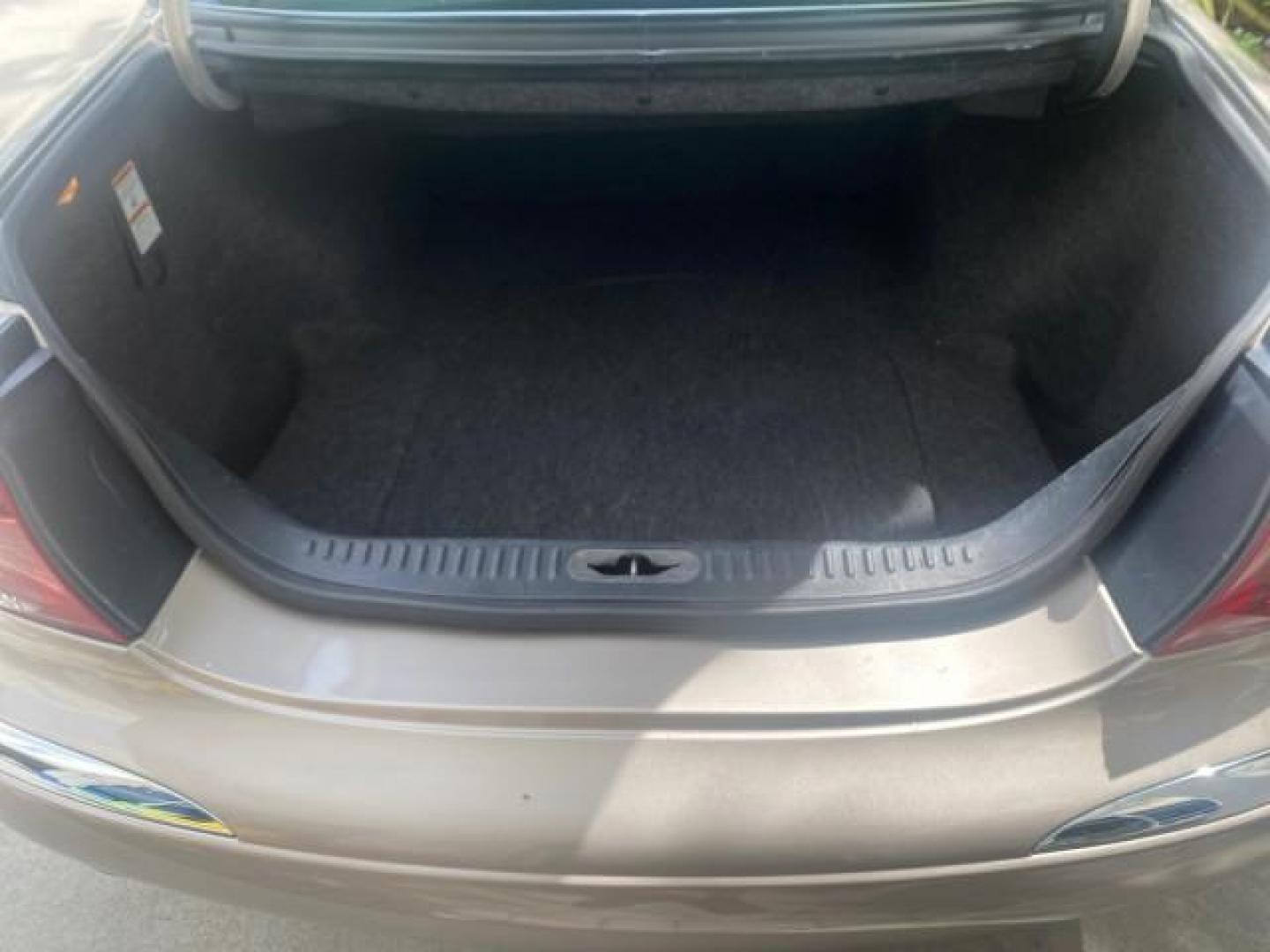 2002 Lt Parchment Gold Metallic /Light Graphite Lincoln Continental LOW MILES 60,071 1 OWNER FLORIDA (1LNHM97V12Y) with an 4.6L DOHC 32-Valve V8 Intech Engine engine, Automatic transmission, located at 4701 North Dixie Hwy, Pompano Beach, FL, 33064, (954) 422-2889, 26.240938, -80.123474 - OUR WEBPAGE FLORIDACARS1.COM HAS OVER 100 PHOTOS AND FREE CARFAX LINK 2002 LINCOLN CONTINENTAL VIN: 1LNHM97V12Y600863 1 L N H M 9 7 V 1 2 Y 6 0 0 8 6 3 SEDAN 4 DR 4.6L V8 F DOHC 32V GASOLINE FRONT WHEEL DRIVE Features ABS Brakes Air Conditioning Alloy Wheels AM/FM Stereo Automatic Transmission Casse - Photo#79