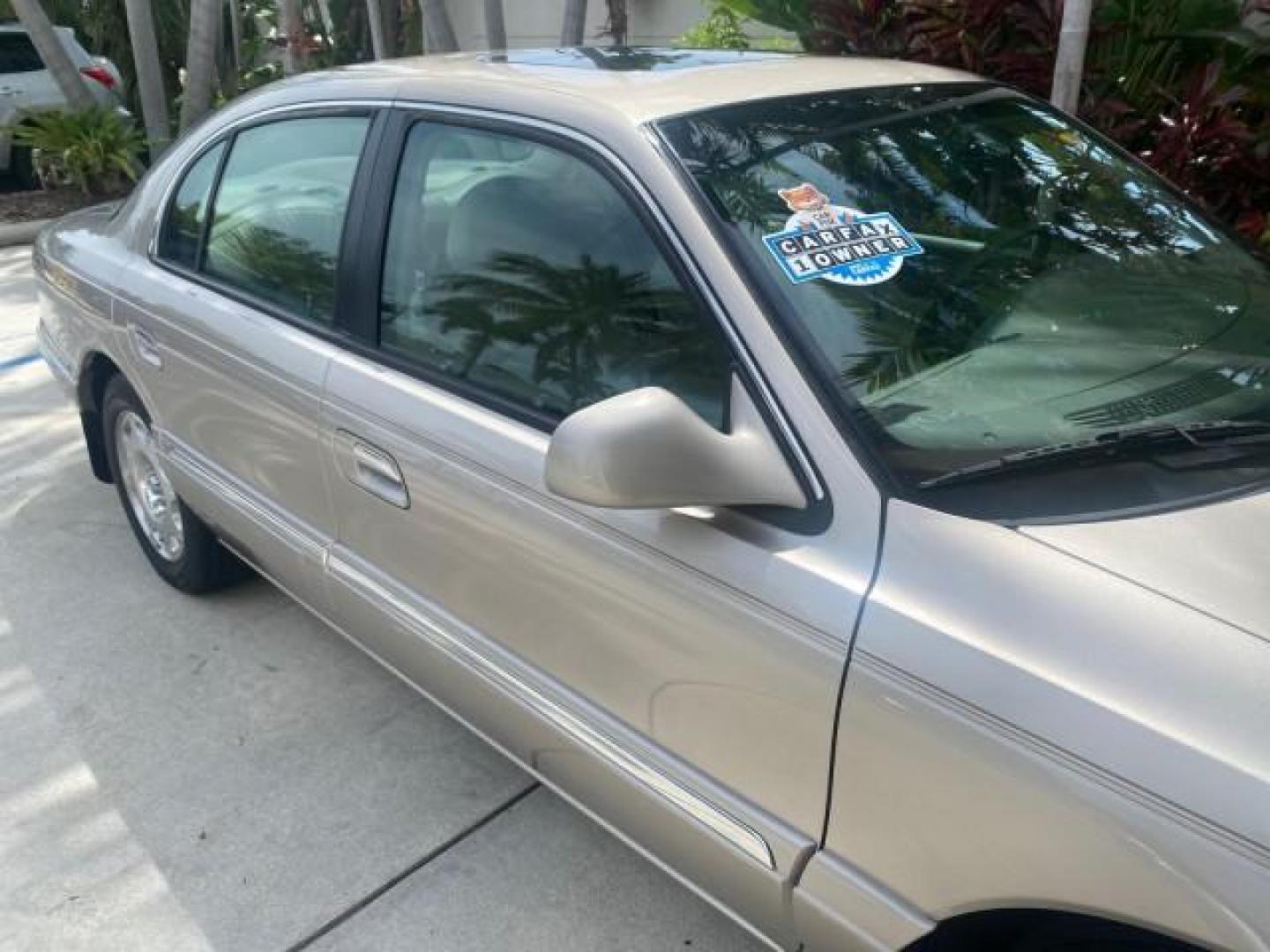 2002 Lt Parchment Gold Metallic /Light Graphite Lincoln Continental LOW MILES 60,071 1 OWNER FLORIDA (1LNHM97V12Y) with an 4.6L DOHC 32-Valve V8 Intech Engine engine, Automatic transmission, located at 4701 North Dixie Hwy, Pompano Beach, FL, 33064, (954) 422-2889, 26.240938, -80.123474 - OUR WEBPAGE FLORIDACARS1.COM HAS OVER 100 PHOTOS AND FREE CARFAX LINK 2002 LINCOLN CONTINENTAL VIN: 1LNHM97V12Y600863 1 L N H M 9 7 V 1 2 Y 6 0 0 8 6 3 SEDAN 4 DR 4.6L V8 F DOHC 32V GASOLINE FRONT WHEEL DRIVE Features ABS Brakes Air Conditioning Alloy Wheels AM/FM Stereo Automatic Transmission Casse - Photo#84