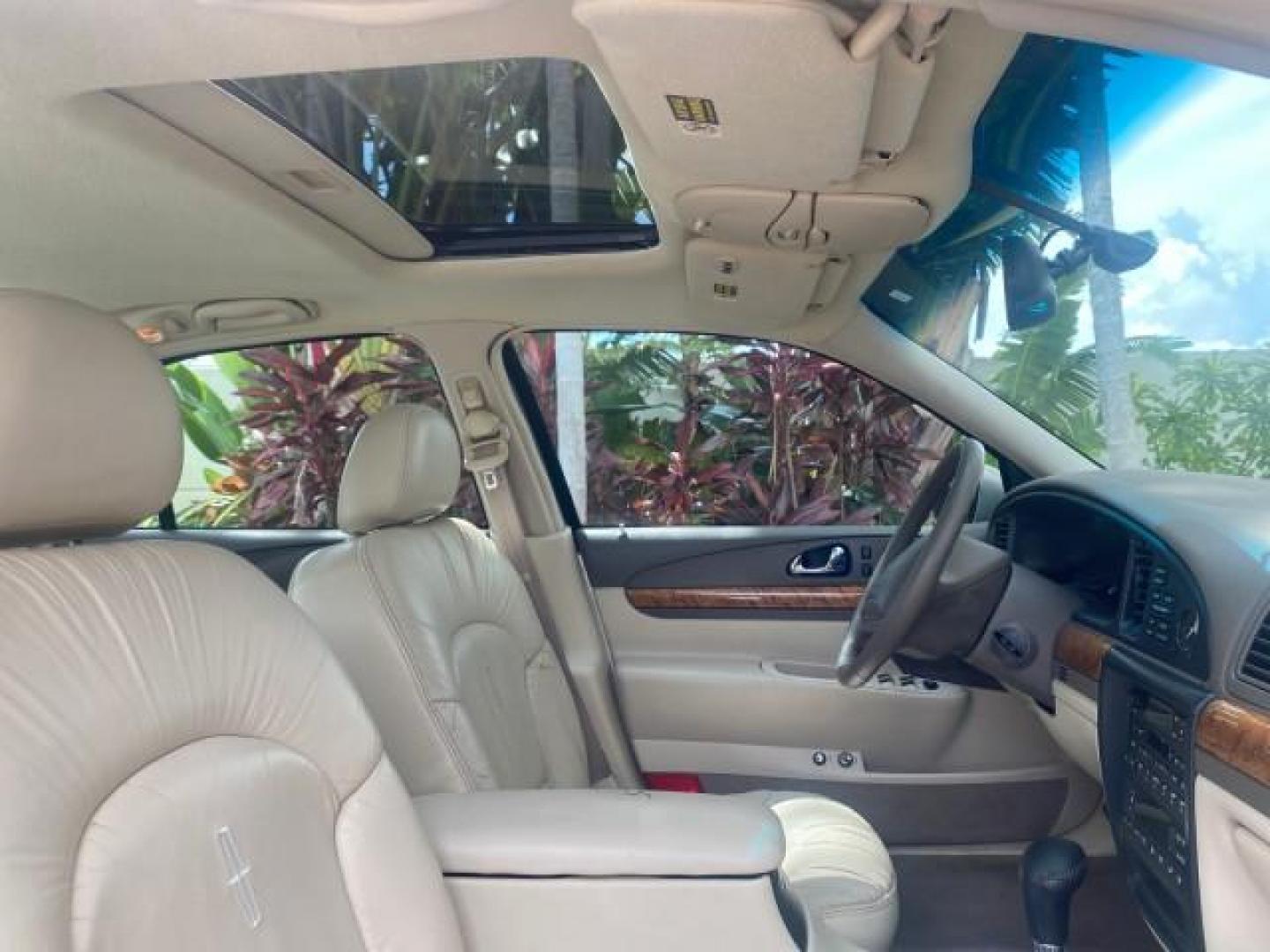 2002 Lt Parchment Gold Metallic /Light Graphite Lincoln Continental LOW MILES 60,071 1 OWNER FLORIDA (1LNHM97V12Y) with an 4.6L DOHC 32-Valve V8 Intech Engine engine, Automatic transmission, located at 4701 North Dixie Hwy, Pompano Beach, FL, 33064, (954) 422-2889, 26.240938, -80.123474 - OUR WEBPAGE FLORIDACARS1.COM HAS OVER 100 PHOTOS AND FREE CARFAX LINK 2002 LINCOLN CONTINENTAL VIN: 1LNHM97V12Y600863 1 L N H M 9 7 V 1 2 Y 6 0 0 8 6 3 SEDAN 4 DR 4.6L V8 F DOHC 32V GASOLINE FRONT WHEEL DRIVE Features ABS Brakes Air Conditioning Alloy Wheels AM/FM Stereo Automatic Transmission Casse - Photo#90