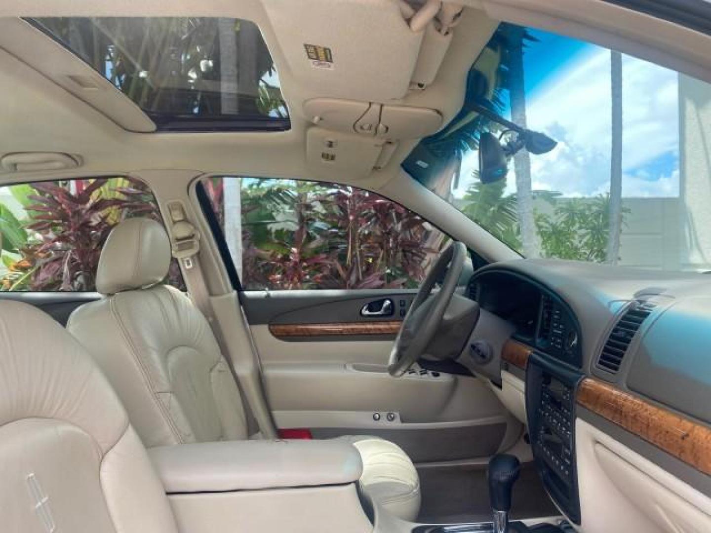 2002 Lt Parchment Gold Metallic /Light Graphite Lincoln Continental LOW MILES 60,071 1 OWNER FLORIDA (1LNHM97V12Y) with an 4.6L DOHC 32-Valve V8 Intech Engine engine, Automatic transmission, located at 4701 North Dixie Hwy, Pompano Beach, FL, 33064, (954) 422-2889, 26.240938, -80.123474 - OUR WEBPAGE FLORIDACARS1.COM HAS OVER 100 PHOTOS AND FREE CARFAX LINK 2002 LINCOLN CONTINENTAL VIN: 1LNHM97V12Y600863 1 L N H M 9 7 V 1 2 Y 6 0 0 8 6 3 SEDAN 4 DR 4.6L V8 F DOHC 32V GASOLINE FRONT WHEEL DRIVE Features ABS Brakes Air Conditioning Alloy Wheels AM/FM Stereo Automatic Transmission Casse - Photo#91