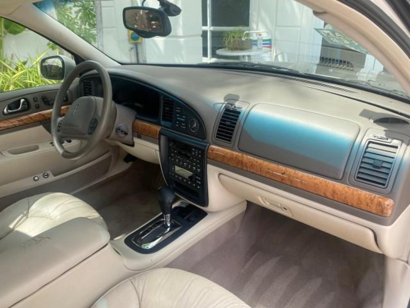 2002 Lt Parchment Gold Metallic /Light Graphite Lincoln Continental LOW MILES 60,071 1 OWNER FLORIDA (1LNHM97V12Y) with an 4.6L DOHC 32-Valve V8 Intech Engine engine, Automatic transmission, located at 4701 North Dixie Hwy, Pompano Beach, FL, 33064, (954) 422-2889, 26.240938, -80.123474 - OUR WEBPAGE FLORIDACARS1.COM HAS OVER 100 PHOTOS AND FREE CARFAX LINK 2002 LINCOLN CONTINENTAL VIN: 1LNHM97V12Y600863 1 L N H M 9 7 V 1 2 Y 6 0 0 8 6 3 SEDAN 4 DR 4.6L V8 F DOHC 32V GASOLINE FRONT WHEEL DRIVE Features ABS Brakes Air Conditioning Alloy Wheels AM/FM Stereo Automatic Transmission Casse - Photo#94