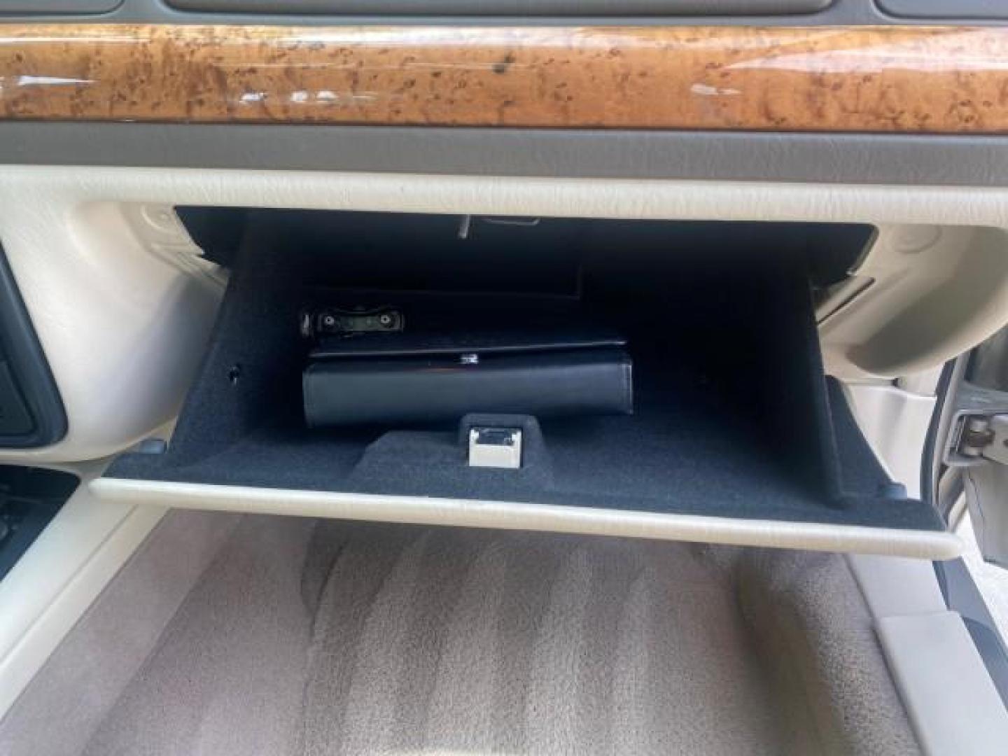 2002 Lt Parchment Gold Metallic /Light Graphite Lincoln Continental LOW MILES 60,071 1 OWNER FLORIDA (1LNHM97V12Y) with an 4.6L DOHC 32-Valve V8 Intech Engine engine, Automatic transmission, located at 4701 North Dixie Hwy, Pompano Beach, FL, 33064, (954) 422-2889, 26.240938, -80.123474 - OUR WEBPAGE FLORIDACARS1.COM HAS OVER 100 PHOTOS AND FREE CARFAX LINK 2002 LINCOLN CONTINENTAL VIN: 1LNHM97V12Y600863 1 L N H M 9 7 V 1 2 Y 6 0 0 8 6 3 SEDAN 4 DR 4.6L V8 F DOHC 32V GASOLINE FRONT WHEEL DRIVE Features ABS Brakes Air Conditioning Alloy Wheels AM/FM Stereo Automatic Transmission Casse - Photo#96