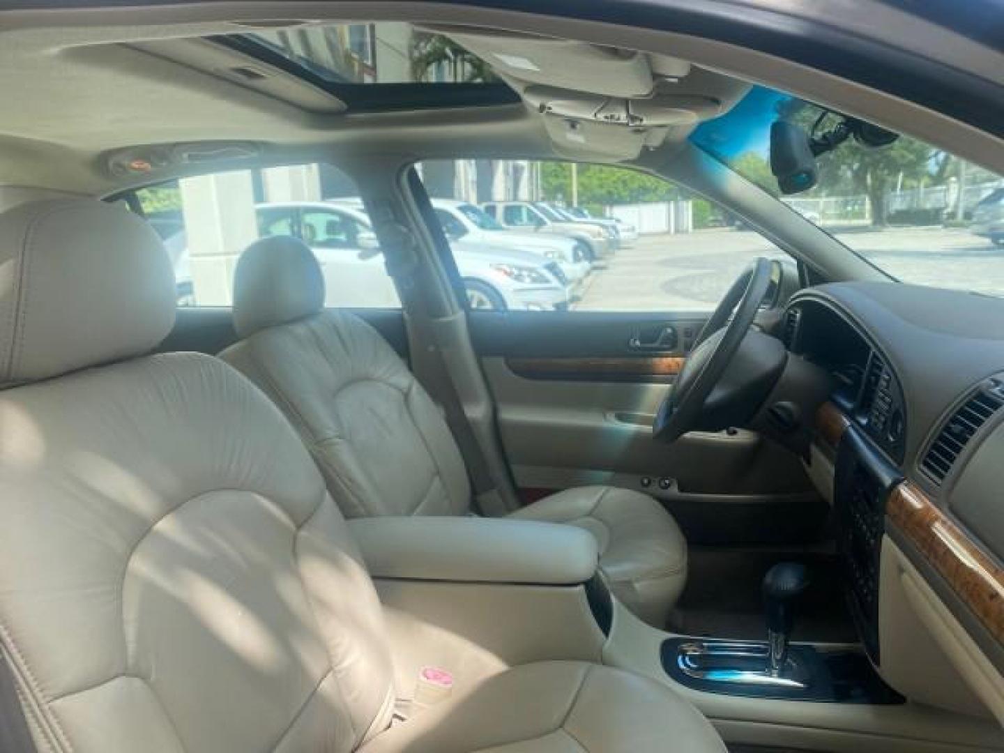 2002 Lt Parchment Gold Metallic /Light Graphite Lincoln Continental LOW MILES 60,071 1 OWNER FLORIDA (1LNHM97V12Y) with an 4.6L DOHC 32-Valve V8 Intech Engine engine, Automatic transmission, located at 4701 North Dixie Hwy, Pompano Beach, FL, 33064, (954) 422-2889, 26.240938, -80.123474 - OUR WEBPAGE FLORIDACARS1.COM HAS OVER 100 PHOTOS AND FREE CARFAX LINK 2002 LINCOLN CONTINENTAL VIN: 1LNHM97V12Y600863 1 L N H M 9 7 V 1 2 Y 6 0 0 8 6 3 SEDAN 4 DR 4.6L V8 F DOHC 32V GASOLINE FRONT WHEEL DRIVE Features ABS Brakes Air Conditioning Alloy Wheels AM/FM Stereo Automatic Transmission Casse - Photo#12