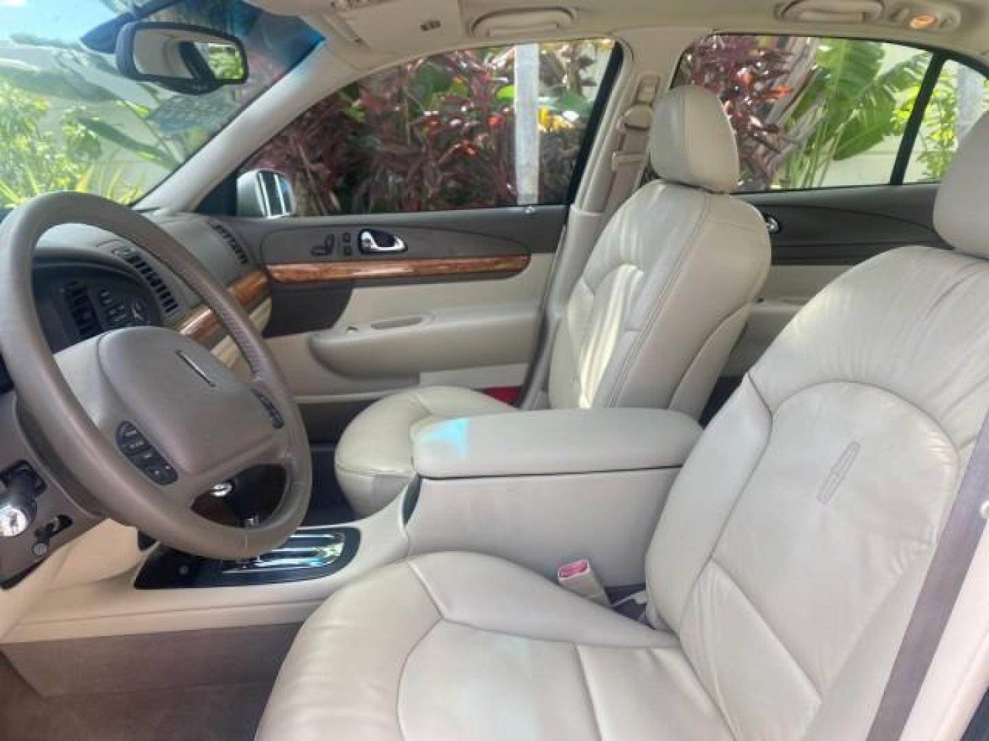 2002 Lt Parchment Gold Metallic /Light Graphite Lincoln Continental LOW MILES 60,071 1 OWNER FLORIDA (1LNHM97V12Y) with an 4.6L DOHC 32-Valve V8 Intech Engine engine, Automatic transmission, located at 4701 North Dixie Hwy, Pompano Beach, FL, 33064, (954) 422-2889, 26.240938, -80.123474 - OUR WEBPAGE FLORIDACARS1.COM HAS OVER 100 PHOTOS AND FREE CARFAX LINK 2002 LINCOLN CONTINENTAL VIN: 1LNHM97V12Y600863 1 L N H M 9 7 V 1 2 Y 6 0 0 8 6 3 SEDAN 4 DR 4.6L V8 F DOHC 32V GASOLINE FRONT WHEEL DRIVE Features ABS Brakes Air Conditioning Alloy Wheels AM/FM Stereo Automatic Transmission Casse - Photo#35