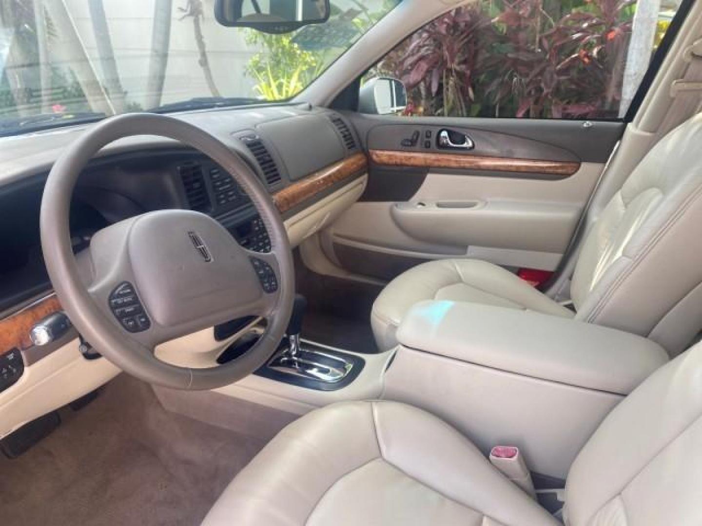 2002 Lt Parchment Gold Metallic /Light Graphite Lincoln Continental LOW MILES 60,071 1 OWNER FLORIDA (1LNHM97V12Y) with an 4.6L DOHC 32-Valve V8 Intech Engine engine, Automatic transmission, located at 4701 North Dixie Hwy, Pompano Beach, FL, 33064, (954) 422-2889, 26.240938, -80.123474 - OUR WEBPAGE FLORIDACARS1.COM HAS OVER 100 PHOTOS AND FREE CARFAX LINK 2002 LINCOLN CONTINENTAL VIN: 1LNHM97V12Y600863 1 L N H M 9 7 V 1 2 Y 6 0 0 8 6 3 SEDAN 4 DR 4.6L V8 F DOHC 32V GASOLINE FRONT WHEEL DRIVE Features ABS Brakes Air Conditioning Alloy Wheels AM/FM Stereo Automatic Transmission Casse - Photo#36