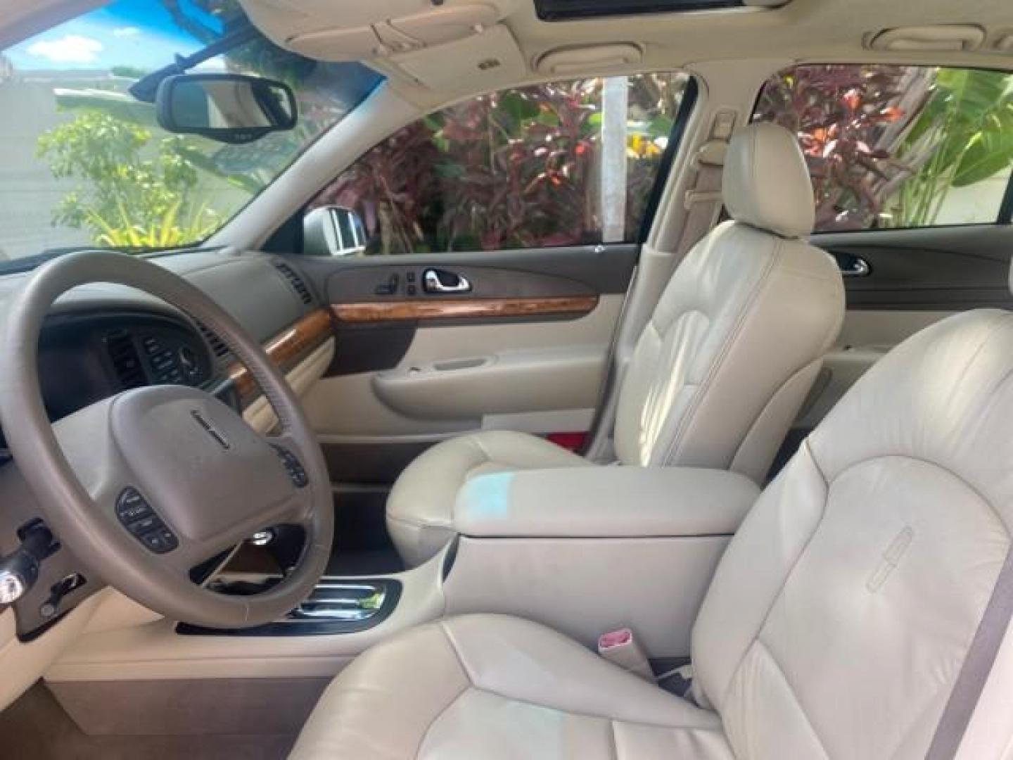 2002 Lt Parchment Gold Metallic /Light Graphite Lincoln Continental LOW MILES 60,071 1 OWNER FLORIDA (1LNHM97V12Y) with an 4.6L DOHC 32-Valve V8 Intech Engine engine, Automatic transmission, located at 4701 North Dixie Hwy, Pompano Beach, FL, 33064, (954) 422-2889, 26.240938, -80.123474 - OUR WEBPAGE FLORIDACARS1.COM HAS OVER 100 PHOTOS AND FREE CARFAX LINK 2002 LINCOLN CONTINENTAL VIN: 1LNHM97V12Y600863 1 L N H M 9 7 V 1 2 Y 6 0 0 8 6 3 SEDAN 4 DR 4.6L V8 F DOHC 32V GASOLINE FRONT WHEEL DRIVE Features ABS Brakes Air Conditioning Alloy Wheels AM/FM Stereo Automatic Transmission Casse - Photo#37