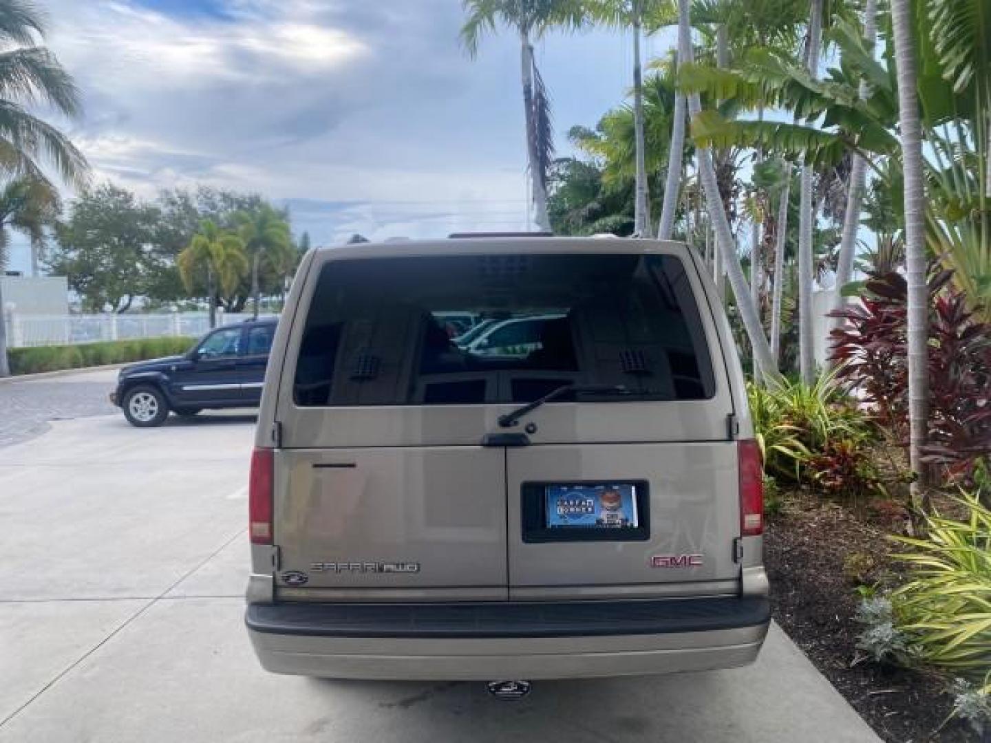 2004 Pewter Metallic /Medium Gray GMC Safari Passenger AWD LOW MILES 84,154 (1GKEL19X34B) with an 4.3L Vortec 4300 V6 MFI Engine engine, Automatic transmission, located at 4701 North Dixie Hwy, Pompano Beach, FL, 33064, (954) 422-2889, 26.240938, -80.123474 - OUR WEBPAGE FLORIDACARS1.COM HAS OVER 100 PHOTOS AND FREE CARFAX LINK 2004 GMC SAFARI VIN: 1GKEL19X34B502356 1 G K E L 1 9 X 3 4 B 5 0 2 3 5 6 VAN 4.3L V6 F GASOLINE ALL WHEEL DRIVE Features 4WD/AWD ABS Brakes Air Conditioning AM/FM Stereo Automatic Transmission Cassette Player CD Audio Convenience - Photo#6