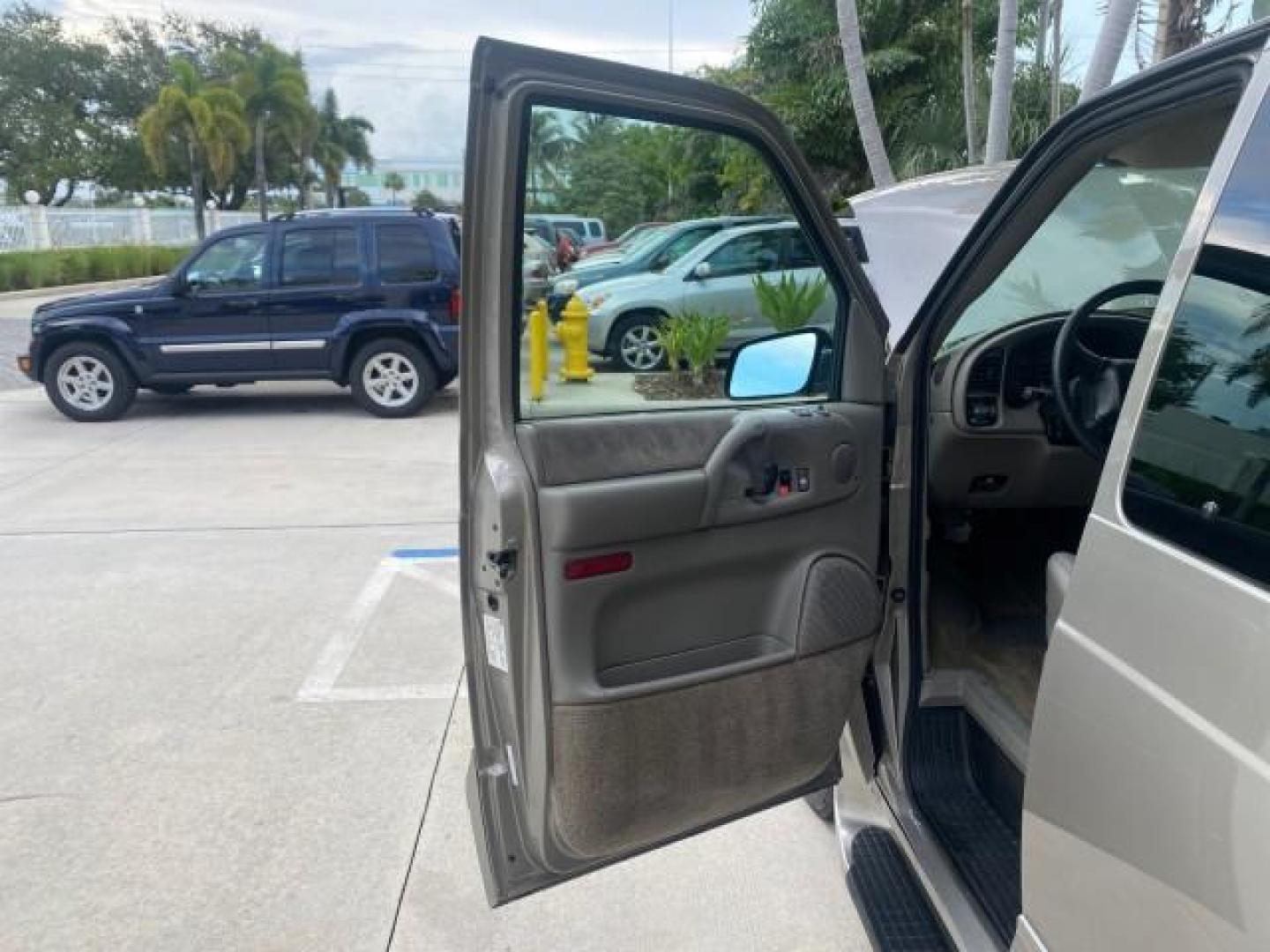 2004 Pewter Metallic /Medium Gray GMC Safari Passenger AWD LOW MILES 84,154 (1GKEL19X34B) with an 4.3L Vortec 4300 V6 MFI Engine engine, Automatic transmission, located at 4701 North Dixie Hwy, Pompano Beach, FL, 33064, (954) 422-2889, 26.240938, -80.123474 - OUR WEBPAGE FLORIDACARS1.COM HAS OVER 100 PHOTOS AND FREE CARFAX LINK 2004 GMC SAFARI VIN: 1GKEL19X34B502356 1 G K E L 1 9 X 3 4 B 5 0 2 3 5 6 VAN 4.3L V6 F GASOLINE ALL WHEEL DRIVE Features 4WD/AWD ABS Brakes Air Conditioning AM/FM Stereo Automatic Transmission Cassette Player CD Audio Convenience - Photo#9