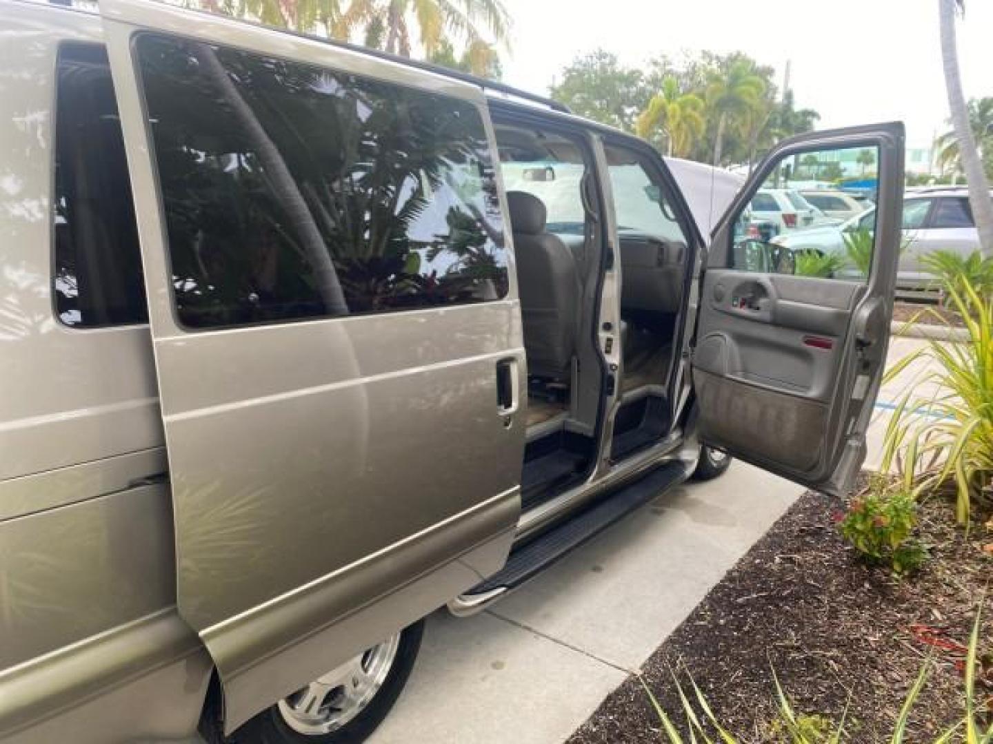 2004 Pewter Metallic /Medium Gray GMC Safari Passenger AWD LOW MILES 84,154 (1GKEL19X34B) with an 4.3L Vortec 4300 V6 MFI Engine engine, Automatic transmission, located at 4701 North Dixie Hwy, Pompano Beach, FL, 33064, (954) 422-2889, 26.240938, -80.123474 - OUR WEBPAGE FLORIDACARS1.COM HAS OVER 100 PHOTOS AND FREE CARFAX LINK 2004 GMC SAFARI VIN: 1GKEL19X34B502356 1 G K E L 1 9 X 3 4 B 5 0 2 3 5 6 VAN 4.3L V6 F GASOLINE ALL WHEEL DRIVE Features 4WD/AWD ABS Brakes Air Conditioning AM/FM Stereo Automatic Transmission Cassette Player CD Audio Convenience - Photo#14