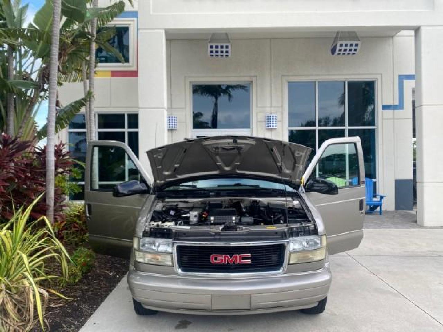2004 Pewter Metallic /Medium Gray GMC Safari Passenger AWD LOW MILES 84,154 (1GKEL19X34B) with an 4.3L Vortec 4300 V6 MFI Engine engine, Automatic transmission, located at 4701 North Dixie Hwy, Pompano Beach, FL, 33064, (954) 422-2889, 26.240938, -80.123474 - OUR WEBPAGE FLORIDACARS1.COM HAS OVER 100 PHOTOS AND FREE CARFAX LINK 2004 GMC SAFARI VIN: 1GKEL19X34B502356 1 G K E L 1 9 X 3 4 B 5 0 2 3 5 6 VAN 4.3L V6 F GASOLINE ALL WHEEL DRIVE Features 4WD/AWD ABS Brakes Air Conditioning AM/FM Stereo Automatic Transmission Cassette Player CD Audio Convenience - Photo#16