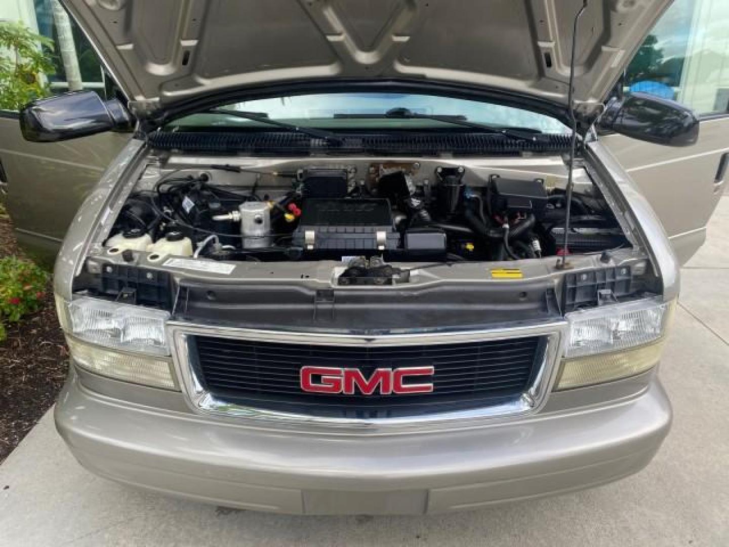 2004 Pewter Metallic /Medium Gray GMC Safari Passenger AWD LOW MILES 84,154 (1GKEL19X34B) with an 4.3L Vortec 4300 V6 MFI Engine engine, Automatic transmission, located at 4701 North Dixie Hwy, Pompano Beach, FL, 33064, (954) 422-2889, 26.240938, -80.123474 - OUR WEBPAGE FLORIDACARS1.COM HAS OVER 100 PHOTOS AND FREE CARFAX LINK 2004 GMC SAFARI VIN: 1GKEL19X34B502356 1 G K E L 1 9 X 3 4 B 5 0 2 3 5 6 VAN 4.3L V6 F GASOLINE ALL WHEEL DRIVE Features 4WD/AWD ABS Brakes Air Conditioning AM/FM Stereo Automatic Transmission Cassette Player CD Audio Convenience - Photo#17