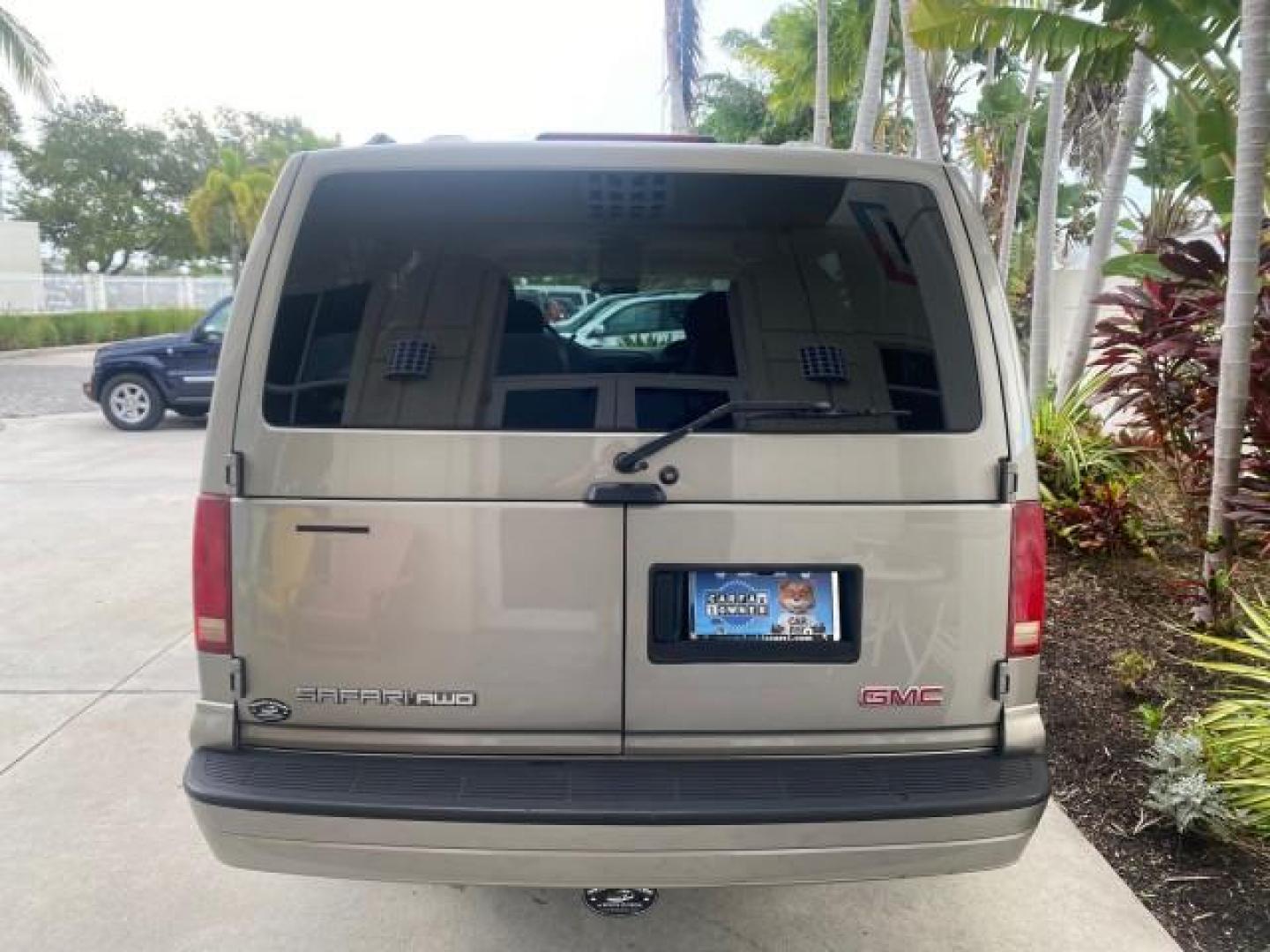 2004 Pewter Metallic /Medium Gray GMC Safari Passenger AWD LOW MILES 84,154 (1GKEL19X34B) with an 4.3L Vortec 4300 V6 MFI Engine engine, Automatic transmission, located at 4701 North Dixie Hwy, Pompano Beach, FL, 33064, (954) 422-2889, 26.240938, -80.123474 - OUR WEBPAGE FLORIDACARS1.COM HAS OVER 100 PHOTOS AND FREE CARFAX LINK 2004 GMC SAFARI VIN: 1GKEL19X34B502356 1 G K E L 1 9 X 3 4 B 5 0 2 3 5 6 VAN 4.3L V6 F GASOLINE ALL WHEEL DRIVE Features 4WD/AWD ABS Brakes Air Conditioning AM/FM Stereo Automatic Transmission Cassette Player CD Audio Convenience - Photo#35