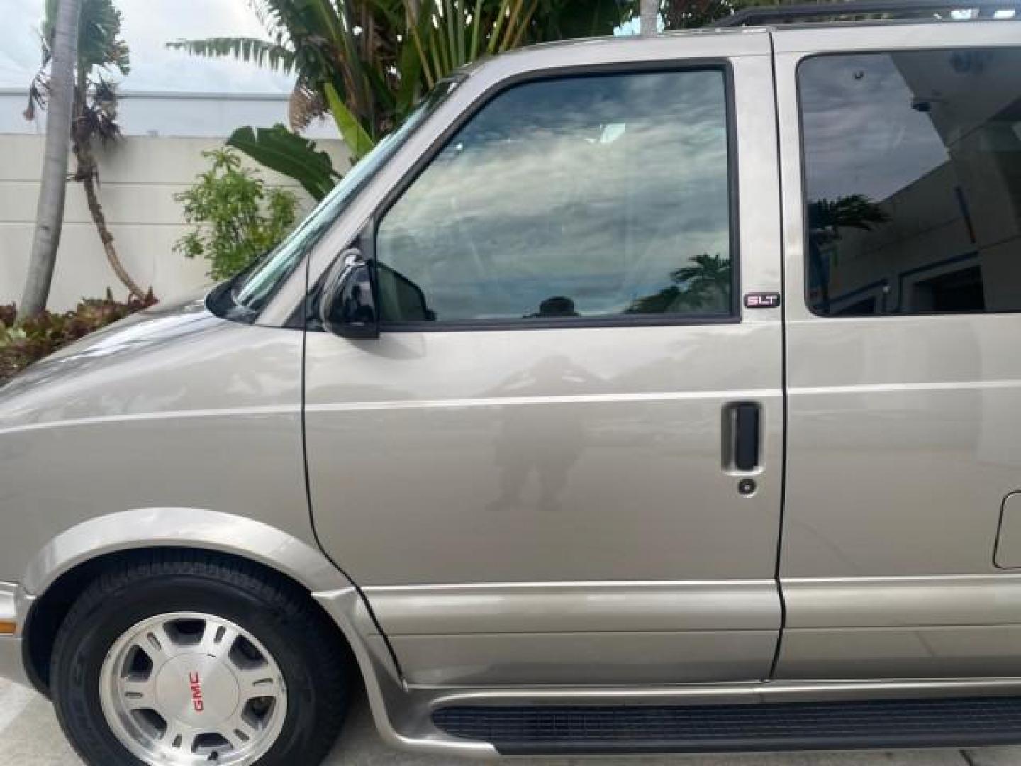2004 Pewter Metallic /Medium Gray GMC Safari Passenger AWD LOW MILES 84,154 (1GKEL19X34B) with an 4.3L Vortec 4300 V6 MFI Engine engine, Automatic transmission, located at 4701 North Dixie Hwy, Pompano Beach, FL, 33064, (954) 422-2889, 26.240938, -80.123474 - OUR WEBPAGE FLORIDACARS1.COM HAS OVER 100 PHOTOS AND FREE CARFAX LINK 2004 GMC SAFARI VIN: 1GKEL19X34B502356 1 G K E L 1 9 X 3 4 B 5 0 2 3 5 6 VAN 4.3L V6 F GASOLINE ALL WHEEL DRIVE Features 4WD/AWD ABS Brakes Air Conditioning AM/FM Stereo Automatic Transmission Cassette Player CD Audio Convenience - Photo#36