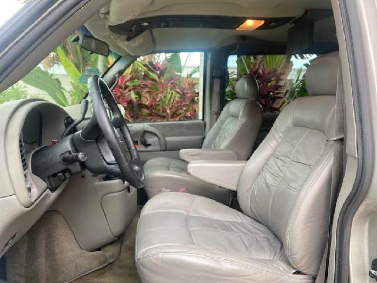 2004 Pewter Metallic /Medium Gray GMC Safari Passenger AWD LOW MILES 84,154 (1GKEL19X34B) with an 4.3L Vortec 4300 V6 MFI Engine engine, Automatic transmission, located at 4701 North Dixie Hwy, Pompano Beach, FL, 33064, (954) 422-2889, 26.240938, -80.123474 - OUR WEBPAGE FLORIDACARS1.COM HAS OVER 100 PHOTOS AND FREE CARFAX LINK 2004 GMC SAFARI VIN: 1GKEL19X34B502356 1 G K E L 1 9 X 3 4 B 5 0 2 3 5 6 VAN 4.3L V6 F GASOLINE ALL WHEEL DRIVE Features 4WD/AWD ABS Brakes Air Conditioning AM/FM Stereo Automatic Transmission Cassette Player CD Audio Convenience - Photo#41