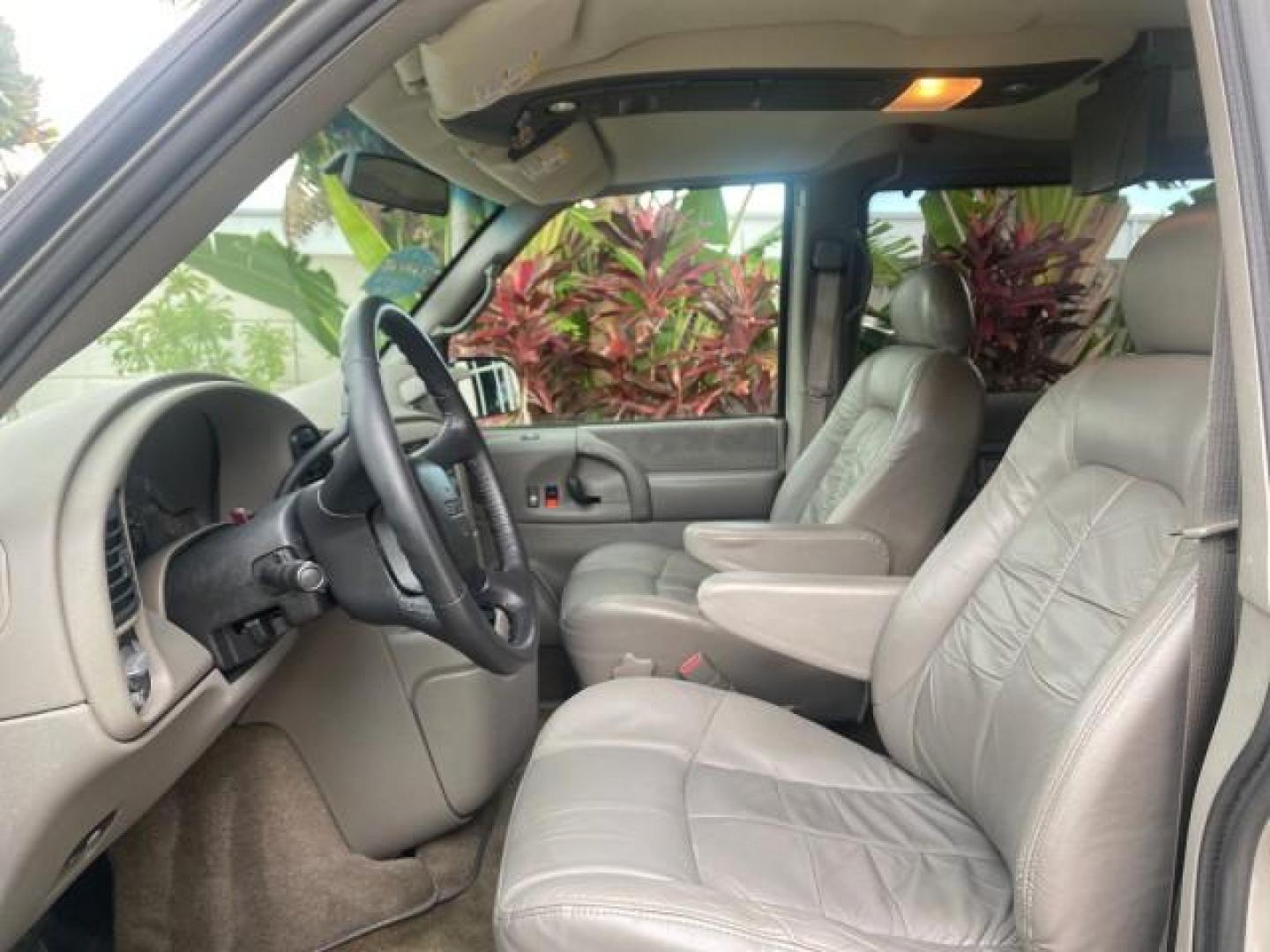 2004 Pewter Metallic /Medium Gray GMC Safari Passenger AWD LOW MILES 84,154 (1GKEL19X34B) with an 4.3L Vortec 4300 V6 MFI Engine engine, Automatic transmission, located at 4701 North Dixie Hwy, Pompano Beach, FL, 33064, (954) 422-2889, 26.240938, -80.123474 - OUR WEBPAGE FLORIDACARS1.COM HAS OVER 100 PHOTOS AND FREE CARFAX LINK 2004 GMC SAFARI VIN: 1GKEL19X34B502356 1 G K E L 1 9 X 3 4 B 5 0 2 3 5 6 VAN 4.3L V6 F GASOLINE ALL WHEEL DRIVE Features 4WD/AWD ABS Brakes Air Conditioning AM/FM Stereo Automatic Transmission Cassette Player CD Audio Convenience - Photo#42