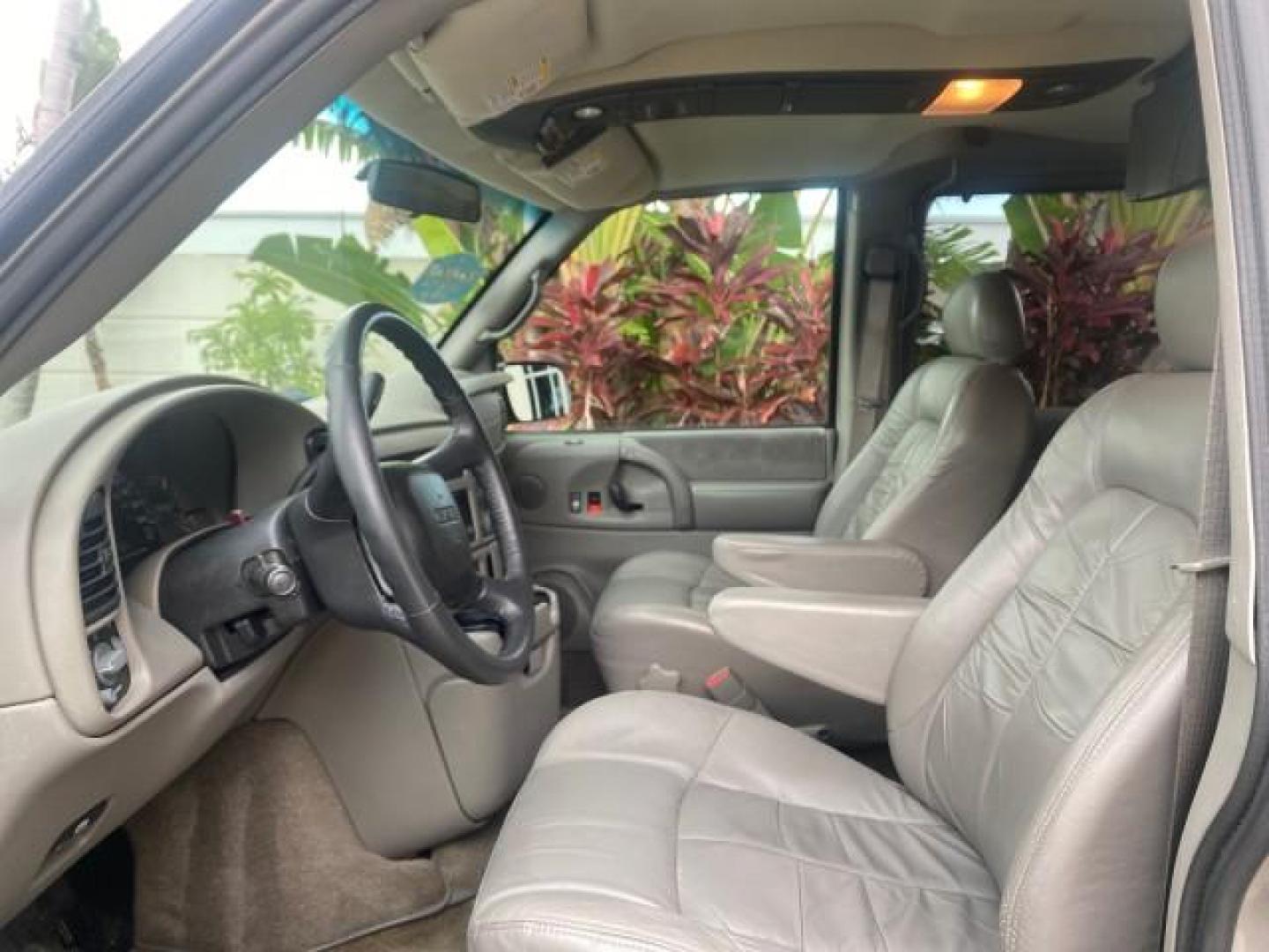 2004 Pewter Metallic /Medium Gray GMC Safari Passenger AWD LOW MILES 84,154 (1GKEL19X34B) with an 4.3L Vortec 4300 V6 MFI Engine engine, Automatic transmission, located at 4701 North Dixie Hwy, Pompano Beach, FL, 33064, (954) 422-2889, 26.240938, -80.123474 - OUR WEBPAGE FLORIDACARS1.COM HAS OVER 100 PHOTOS AND FREE CARFAX LINK 2004 GMC SAFARI VIN: 1GKEL19X34B502356 1 G K E L 1 9 X 3 4 B 5 0 2 3 5 6 VAN 4.3L V6 F GASOLINE ALL WHEEL DRIVE Features 4WD/AWD ABS Brakes Air Conditioning AM/FM Stereo Automatic Transmission Cassette Player CD Audio Convenience - Photo#43