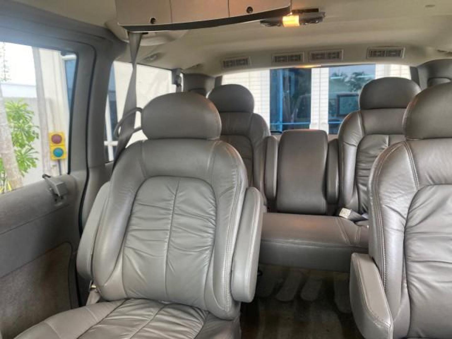 2004 Pewter Metallic /Medium Gray GMC Safari Passenger AWD LOW MILES 84,154 (1GKEL19X34B) with an 4.3L Vortec 4300 V6 MFI Engine engine, Automatic transmission, located at 4701 North Dixie Hwy, Pompano Beach, FL, 33064, (954) 422-2889, 26.240938, -80.123474 - OUR WEBPAGE FLORIDACARS1.COM HAS OVER 100 PHOTOS AND FREE CARFAX LINK 2004 GMC SAFARI VIN: 1GKEL19X34B502356 1 G K E L 1 9 X 3 4 B 5 0 2 3 5 6 VAN 4.3L V6 F GASOLINE ALL WHEEL DRIVE Features 4WD/AWD ABS Brakes Air Conditioning AM/FM Stereo Automatic Transmission Cassette Player CD Audio Convenience - Photo#64