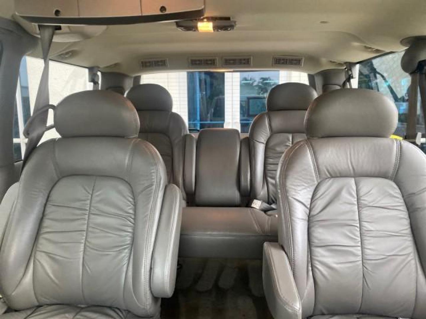 2004 Pewter Metallic /Medium Gray GMC Safari Passenger AWD LOW MILES 84,154 (1GKEL19X34B) with an 4.3L Vortec 4300 V6 MFI Engine engine, Automatic transmission, located at 4701 North Dixie Hwy, Pompano Beach, FL, 33064, (954) 422-2889, 26.240938, -80.123474 - OUR WEBPAGE FLORIDACARS1.COM HAS OVER 100 PHOTOS AND FREE CARFAX LINK 2004 GMC SAFARI VIN: 1GKEL19X34B502356 1 G K E L 1 9 X 3 4 B 5 0 2 3 5 6 VAN 4.3L V6 F GASOLINE ALL WHEEL DRIVE Features 4WD/AWD ABS Brakes Air Conditioning AM/FM Stereo Automatic Transmission Cassette Player CD Audio Convenience - Photo#65
