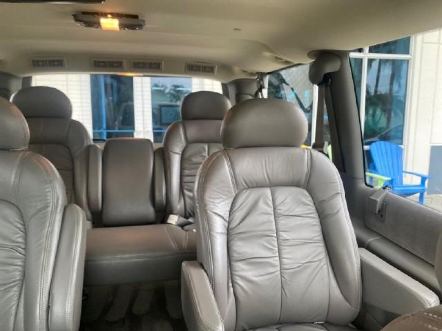 2004 Pewter Metallic /Medium Gray GMC Safari Passenger AWD LOW MILES 84,154 (1GKEL19X34B) with an 4.3L Vortec 4300 V6 MFI Engine engine, Automatic transmission, located at 4701 North Dixie Hwy, Pompano Beach, FL, 33064, (954) 422-2889, 26.240938, -80.123474 - OUR WEBPAGE FLORIDACARS1.COM HAS OVER 100 PHOTOS AND FREE CARFAX LINK 2004 GMC SAFARI VIN: 1GKEL19X34B502356 1 G K E L 1 9 X 3 4 B 5 0 2 3 5 6 VAN 4.3L V6 F GASOLINE ALL WHEEL DRIVE Features 4WD/AWD ABS Brakes Air Conditioning AM/FM Stereo Automatic Transmission Cassette Player CD Audio Convenience - Photo#66