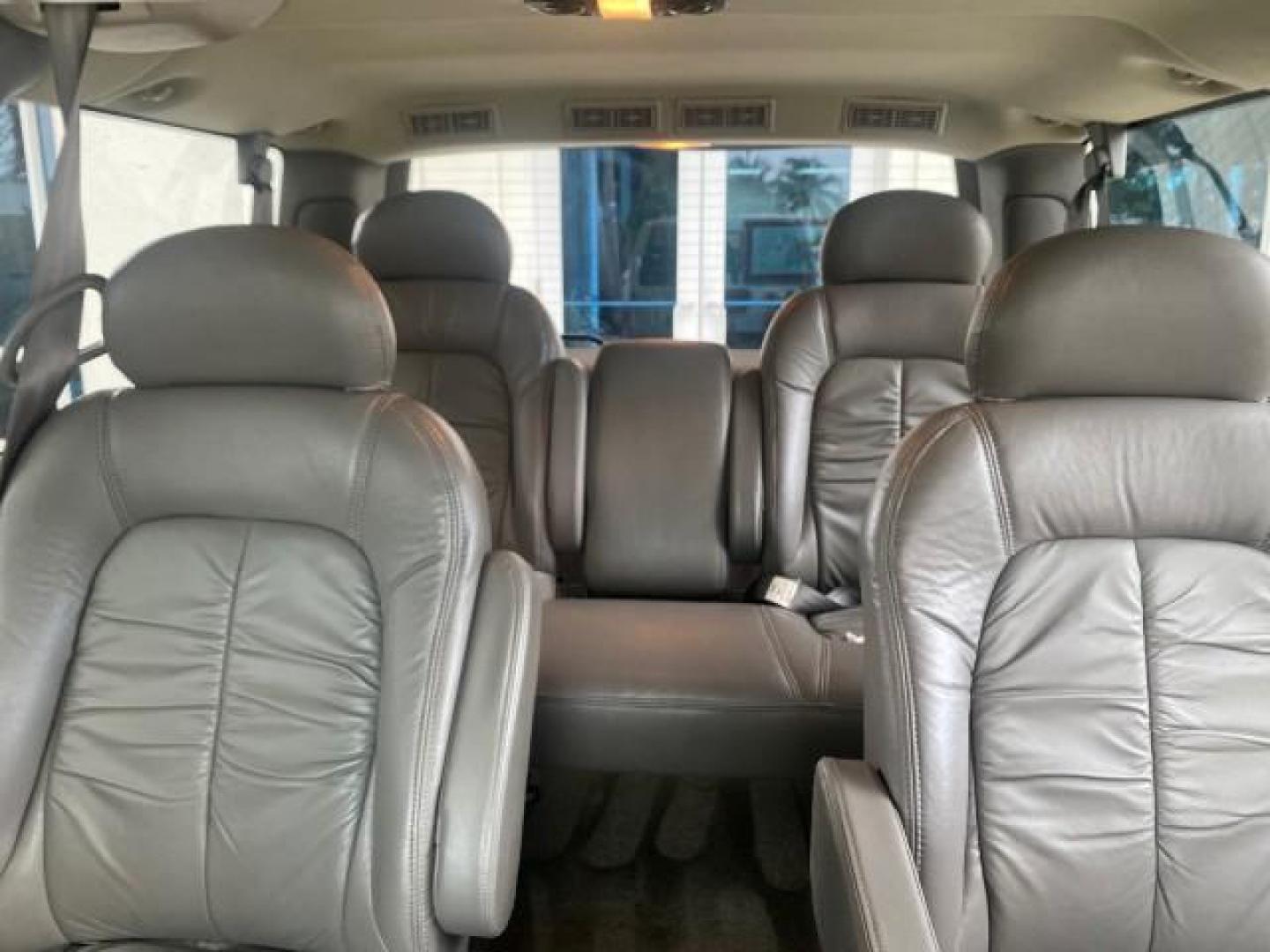 2004 Pewter Metallic /Medium Gray GMC Safari Passenger AWD LOW MILES 84,154 (1GKEL19X34B) with an 4.3L Vortec 4300 V6 MFI Engine engine, Automatic transmission, located at 4701 North Dixie Hwy, Pompano Beach, FL, 33064, (954) 422-2889, 26.240938, -80.123474 - OUR WEBPAGE FLORIDACARS1.COM HAS OVER 100 PHOTOS AND FREE CARFAX LINK 2004 GMC SAFARI VIN: 1GKEL19X34B502356 1 G K E L 1 9 X 3 4 B 5 0 2 3 5 6 VAN 4.3L V6 F GASOLINE ALL WHEEL DRIVE Features 4WD/AWD ABS Brakes Air Conditioning AM/FM Stereo Automatic Transmission Cassette Player CD Audio Convenience - Photo#67