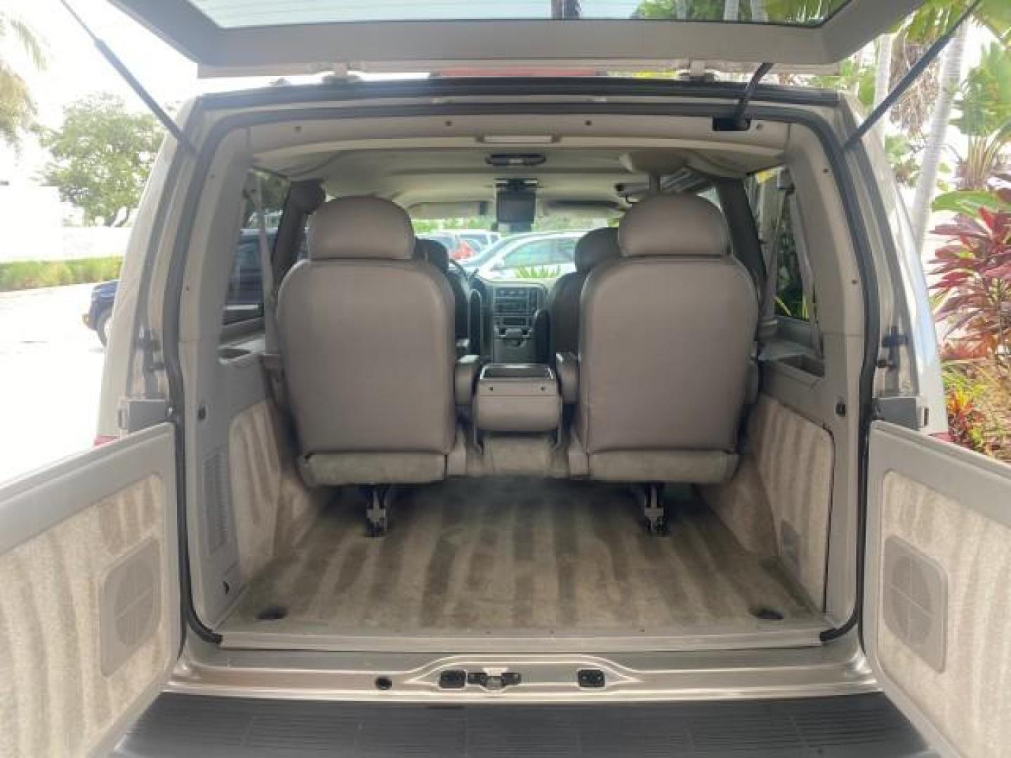 2004 Pewter Metallic /Medium Gray GMC Safari Passenger AWD LOW MILES 84,154 (1GKEL19X34B) with an 4.3L Vortec 4300 V6 MFI Engine engine, Automatic transmission, located at 4701 North Dixie Hwy, Pompano Beach, FL, 33064, (954) 422-2889, 26.240938, -80.123474 - OUR WEBPAGE FLORIDACARS1.COM HAS OVER 100 PHOTOS AND FREE CARFAX LINK 2004 GMC SAFARI VIN: 1GKEL19X34B502356 1 G K E L 1 9 X 3 4 B 5 0 2 3 5 6 VAN 4.3L V6 F GASOLINE ALL WHEEL DRIVE Features 4WD/AWD ABS Brakes Air Conditioning AM/FM Stereo Automatic Transmission Cassette Player CD Audio Convenience - Photo#73