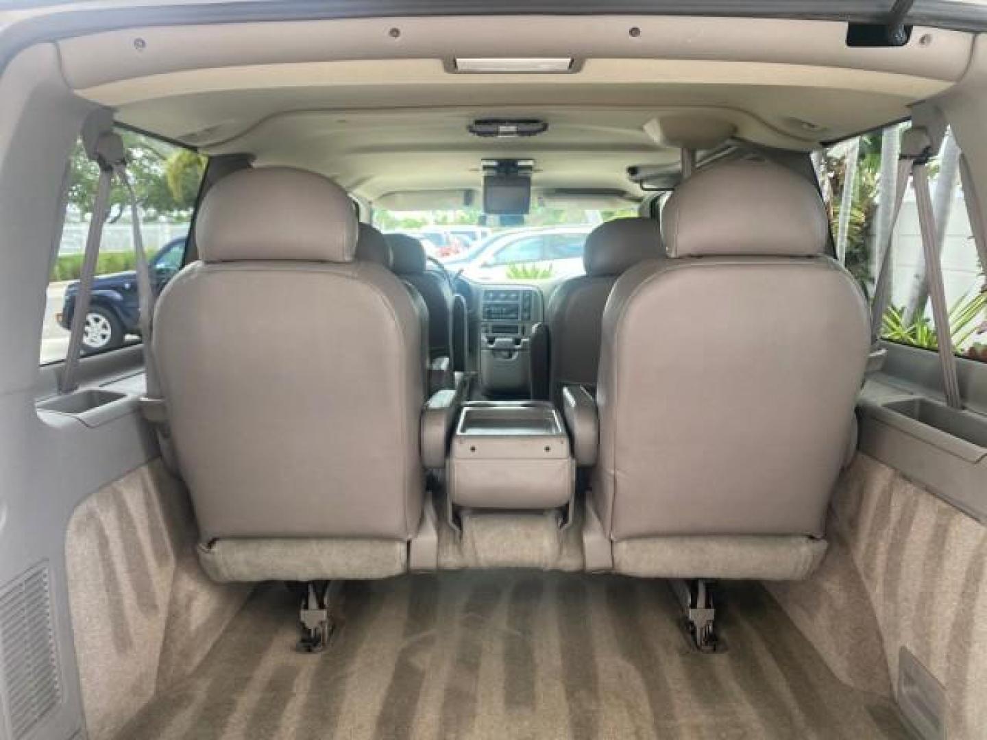 2004 Pewter Metallic /Medium Gray GMC Safari Passenger AWD LOW MILES 84,154 (1GKEL19X34B) with an 4.3L Vortec 4300 V6 MFI Engine engine, Automatic transmission, located at 4701 North Dixie Hwy, Pompano Beach, FL, 33064, (954) 422-2889, 26.240938, -80.123474 - OUR WEBPAGE FLORIDACARS1.COM HAS OVER 100 PHOTOS AND FREE CARFAX LINK 2004 GMC SAFARI VIN: 1GKEL19X34B502356 1 G K E L 1 9 X 3 4 B 5 0 2 3 5 6 VAN 4.3L V6 F GASOLINE ALL WHEEL DRIVE Features 4WD/AWD ABS Brakes Air Conditioning AM/FM Stereo Automatic Transmission Cassette Player CD Audio Convenience - Photo#74