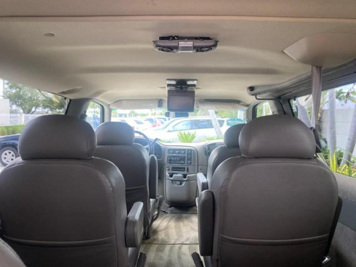 2004 Pewter Metallic /Medium Gray GMC Safari Passenger AWD LOW MILES 84,154 (1GKEL19X34B) with an 4.3L Vortec 4300 V6 MFI Engine engine, Automatic transmission, located at 4701 North Dixie Hwy, Pompano Beach, FL, 33064, (954) 422-2889, 26.240938, -80.123474 - OUR WEBPAGE FLORIDACARS1.COM HAS OVER 100 PHOTOS AND FREE CARFAX LINK 2004 GMC SAFARI VIN: 1GKEL19X34B502356 1 G K E L 1 9 X 3 4 B 5 0 2 3 5 6 VAN 4.3L V6 F GASOLINE ALL WHEEL DRIVE Features 4WD/AWD ABS Brakes Air Conditioning AM/FM Stereo Automatic Transmission Cassette Player CD Audio Convenience - Photo#76