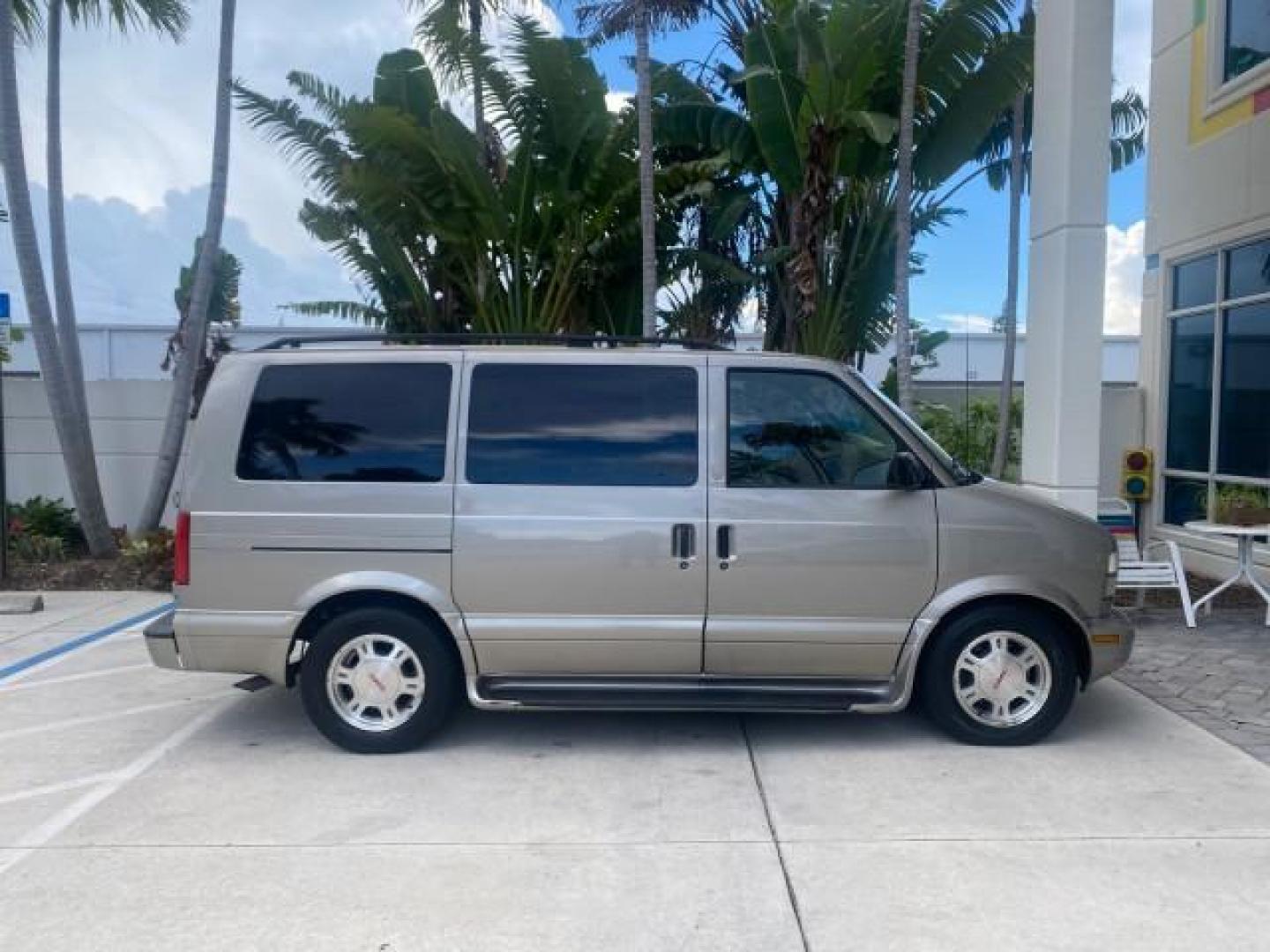 2004 Pewter Metallic /Medium Gray GMC Safari Passenger AWD LOW MILES 84,154 (1GKEL19X34B) with an 4.3L Vortec 4300 V6 MFI Engine engine, Automatic transmission, located at 4701 North Dixie Hwy, Pompano Beach, FL, 33064, (954) 422-2889, 26.240938, -80.123474 - OUR WEBPAGE FLORIDACARS1.COM HAS OVER 100 PHOTOS AND FREE CARFAX LINK 2004 GMC SAFARI VIN: 1GKEL19X34B502356 1 G K E L 1 9 X 3 4 B 5 0 2 3 5 6 VAN 4.3L V6 F GASOLINE ALL WHEEL DRIVE Features 4WD/AWD ABS Brakes Air Conditioning AM/FM Stereo Automatic Transmission Cassette Player CD Audio Convenience - Photo#82