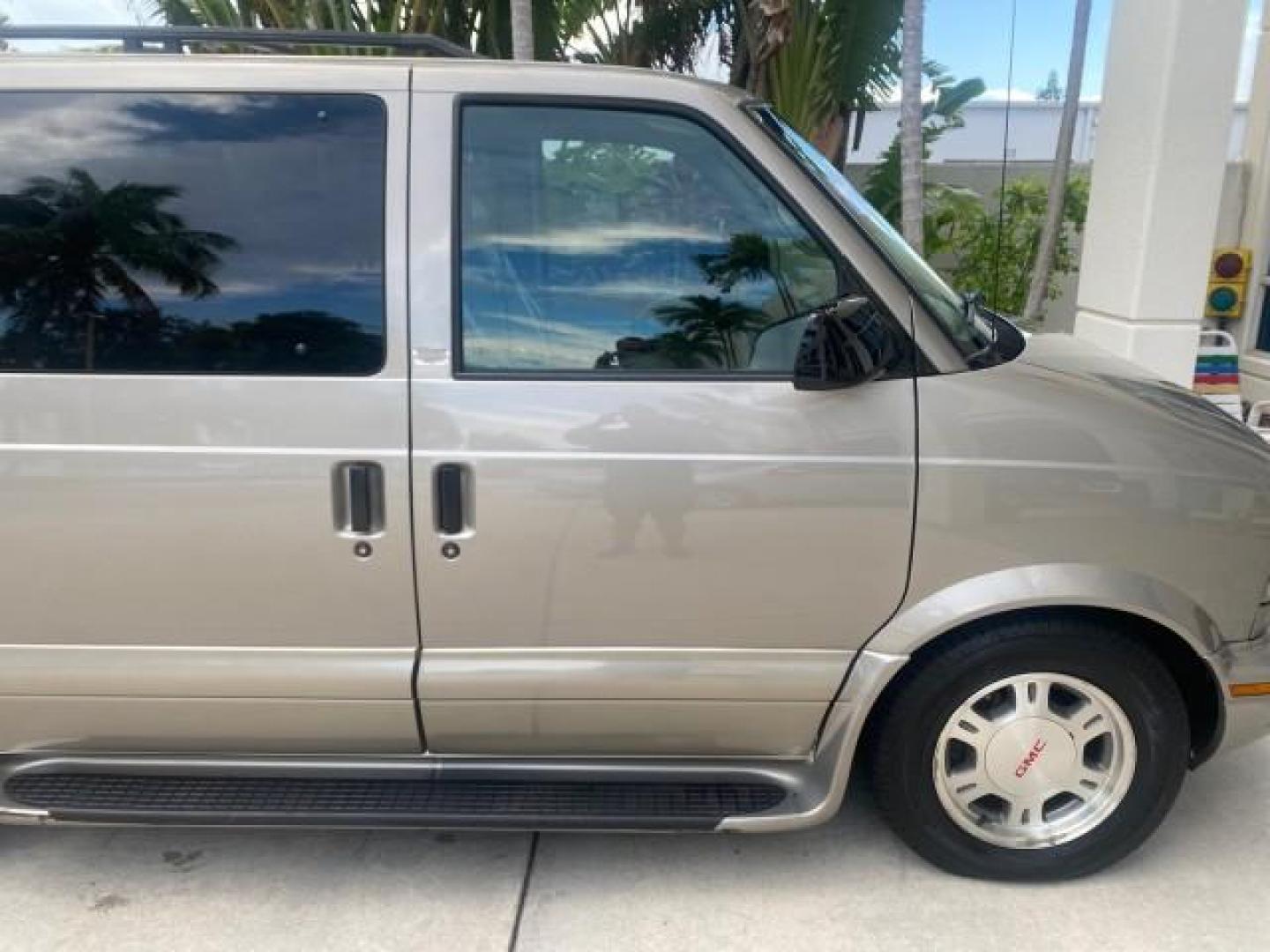 2004 Pewter Metallic /Medium Gray GMC Safari Passenger AWD LOW MILES 84,154 (1GKEL19X34B) with an 4.3L Vortec 4300 V6 MFI Engine engine, Automatic transmission, located at 4701 North Dixie Hwy, Pompano Beach, FL, 33064, (954) 422-2889, 26.240938, -80.123474 - OUR WEBPAGE FLORIDACARS1.COM HAS OVER 100 PHOTOS AND FREE CARFAX LINK 2004 GMC SAFARI VIN: 1GKEL19X34B502356 1 G K E L 1 9 X 3 4 B 5 0 2 3 5 6 VAN 4.3L V6 F GASOLINE ALL WHEEL DRIVE Features 4WD/AWD ABS Brakes Air Conditioning AM/FM Stereo Automatic Transmission Cassette Player CD Audio Convenience - Photo#88