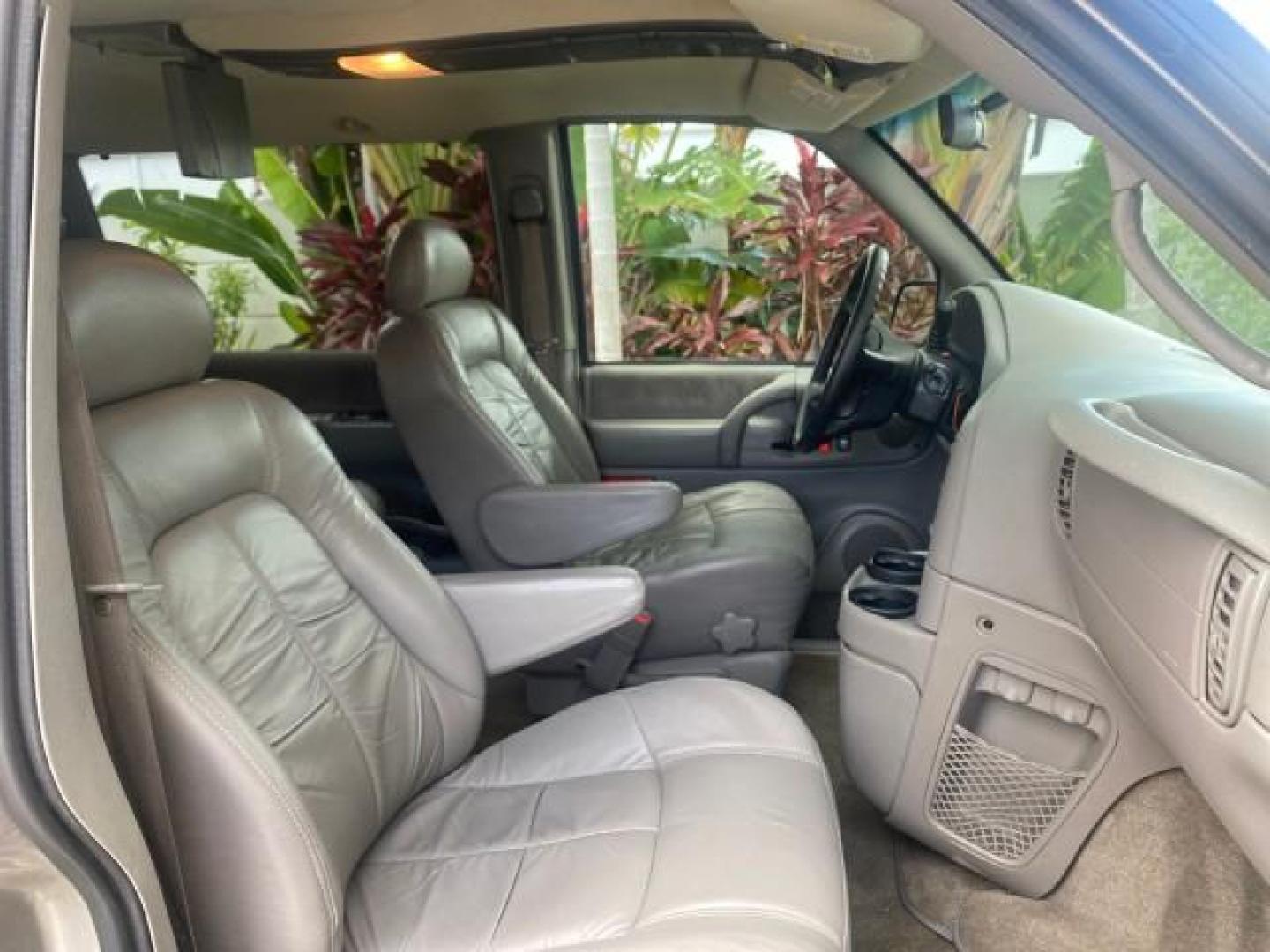 2004 Pewter Metallic /Medium Gray GMC Safari Passenger AWD LOW MILES 84,154 (1GKEL19X34B) with an 4.3L Vortec 4300 V6 MFI Engine engine, Automatic transmission, located at 4701 North Dixie Hwy, Pompano Beach, FL, 33064, (954) 422-2889, 26.240938, -80.123474 - OUR WEBPAGE FLORIDACARS1.COM HAS OVER 100 PHOTOS AND FREE CARFAX LINK 2004 GMC SAFARI VIN: 1GKEL19X34B502356 1 G K E L 1 9 X 3 4 B 5 0 2 3 5 6 VAN 4.3L V6 F GASOLINE ALL WHEEL DRIVE Features 4WD/AWD ABS Brakes Air Conditioning AM/FM Stereo Automatic Transmission Cassette Player CD Audio Convenience - Photo#95
