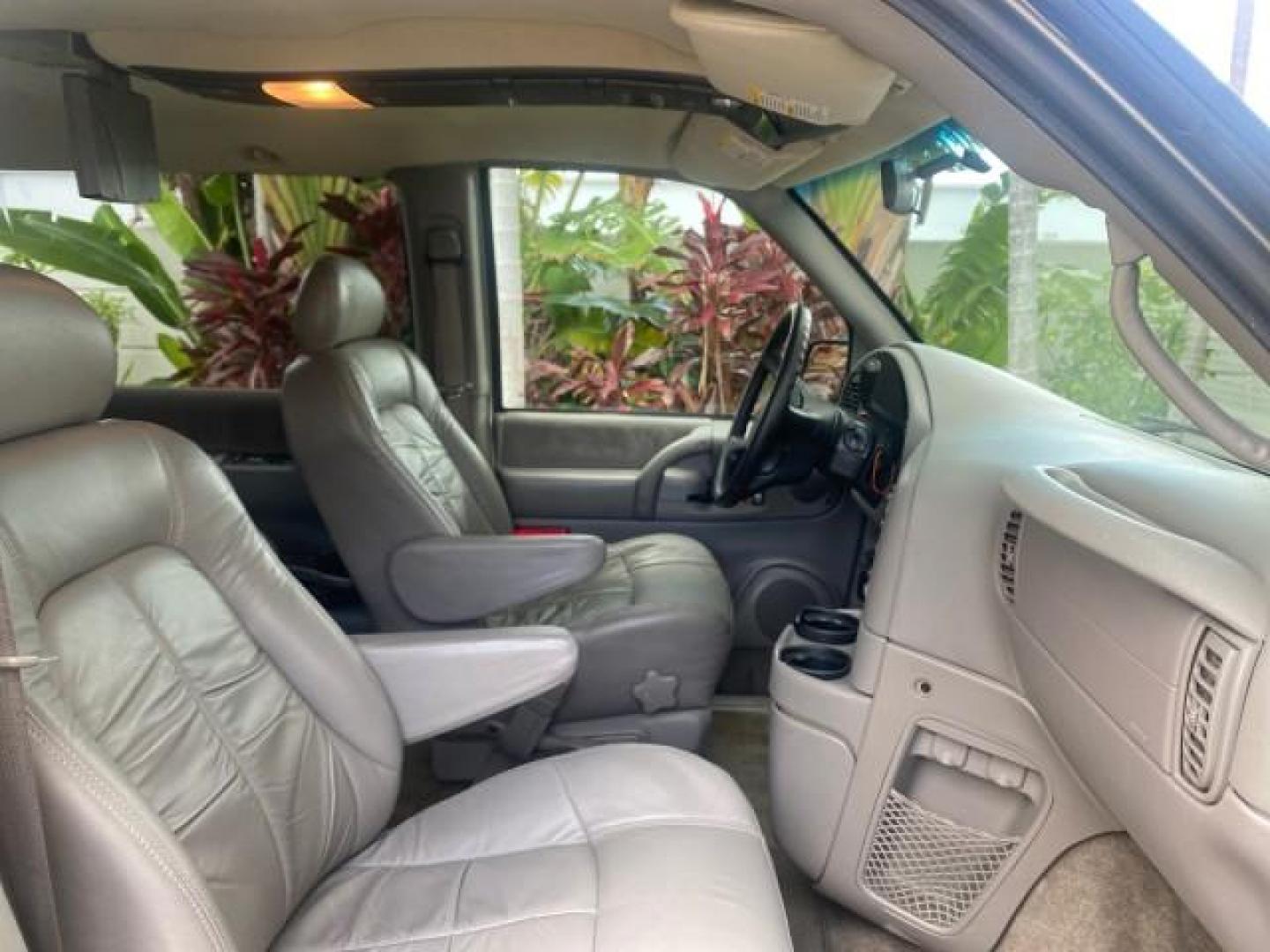 2004 Pewter Metallic /Medium Gray GMC Safari Passenger AWD LOW MILES 84,154 (1GKEL19X34B) with an 4.3L Vortec 4300 V6 MFI Engine engine, Automatic transmission, located at 4701 North Dixie Hwy, Pompano Beach, FL, 33064, (954) 422-2889, 26.240938, -80.123474 - OUR WEBPAGE FLORIDACARS1.COM HAS OVER 100 PHOTOS AND FREE CARFAX LINK 2004 GMC SAFARI VIN: 1GKEL19X34B502356 1 G K E L 1 9 X 3 4 B 5 0 2 3 5 6 VAN 4.3L V6 F GASOLINE ALL WHEEL DRIVE Features 4WD/AWD ABS Brakes Air Conditioning AM/FM Stereo Automatic Transmission Cassette Player CD Audio Convenience - Photo#96