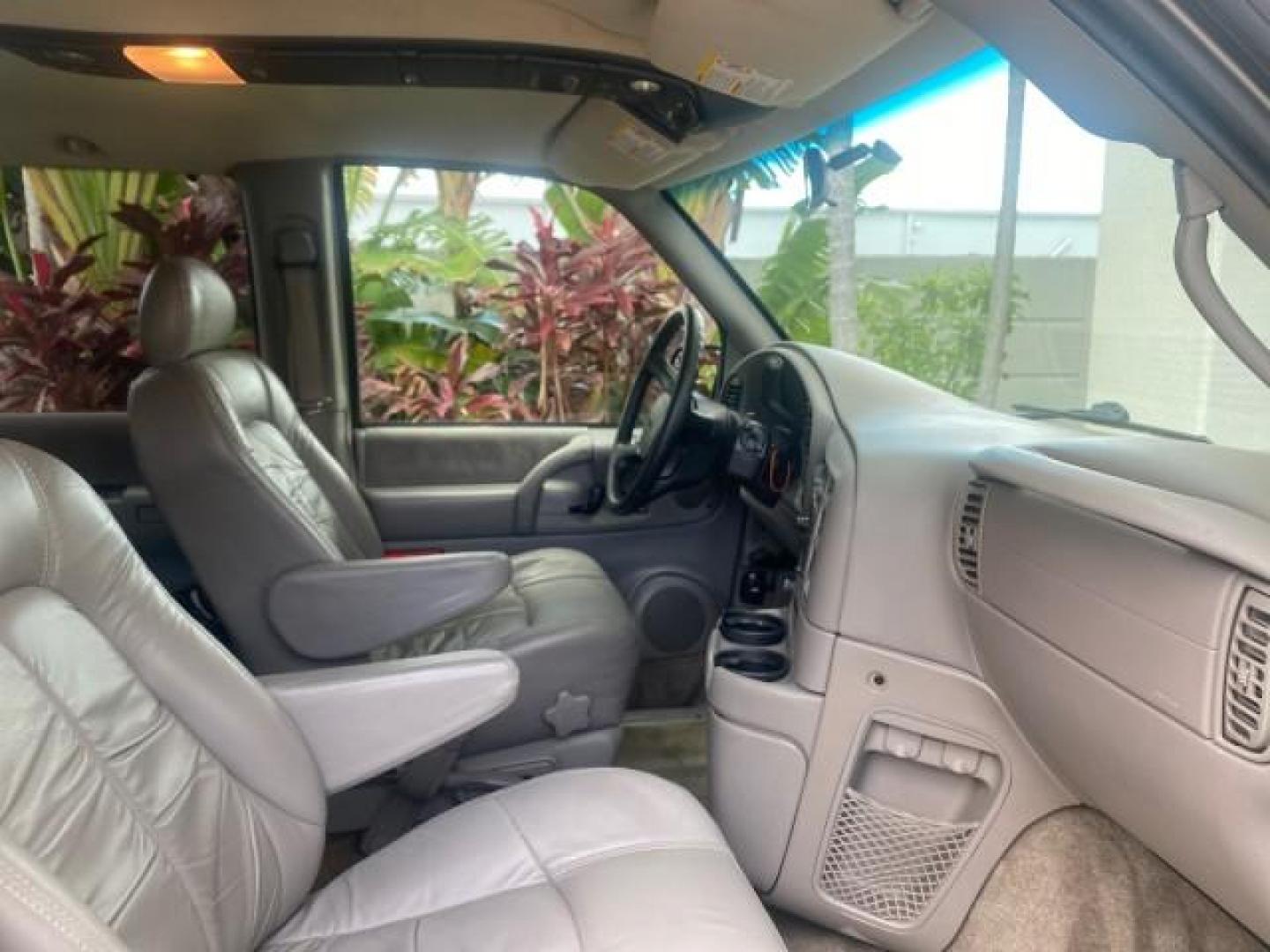 2004 Pewter Metallic /Medium Gray GMC Safari Passenger AWD LOW MILES 84,154 (1GKEL19X34B) with an 4.3L Vortec 4300 V6 MFI Engine engine, Automatic transmission, located at 4701 North Dixie Hwy, Pompano Beach, FL, 33064, (954) 422-2889, 26.240938, -80.123474 - OUR WEBPAGE FLORIDACARS1.COM HAS OVER 100 PHOTOS AND FREE CARFAX LINK 2004 GMC SAFARI VIN: 1GKEL19X34B502356 1 G K E L 1 9 X 3 4 B 5 0 2 3 5 6 VAN 4.3L V6 F GASOLINE ALL WHEEL DRIVE Features 4WD/AWD ABS Brakes Air Conditioning AM/FM Stereo Automatic Transmission Cassette Player CD Audio Convenience - Photo#98