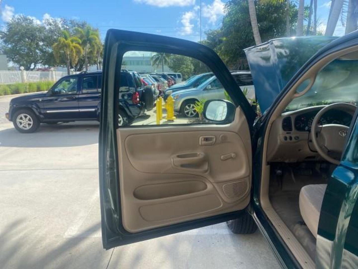 2003 Imperial Jade Mica /Oak Toyota Tundra LOW MILES 65,744 1 OWNER FL (5TBJN32173S) with an 3.4L DOHC EFI 24-Valve V6 Engine engine, Automatic transmission, located at 4701 North Dixie Hwy, Pompano Beach, FL, 33064, (954) 422-2889, 26.240938, -80.123474 - OUR WEBPAGE FLORIDACARS1.COM HAS OVER 100 PHOTOS AND FREE CARFAX LINK 2003 TOYOTA TUNDRA VIN: 5TBJN32173S387816 5 T B J N 3 2 1 7 3 S 3 8 7 8 1 6 PICKUP 3.4L V6 F DOHC 24V GASOLINE REAR WHEEL DRIVE Features ABS Brakes Air Conditioning AM/FM Stereo Automatic Transmission Bed Liner CD Audio Cloth Seat - Photo#9