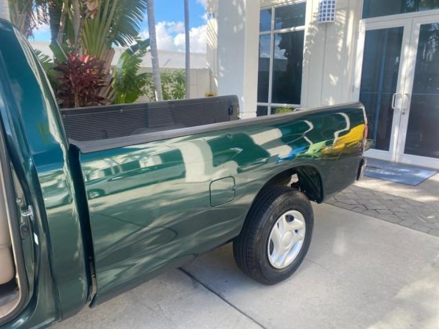 2003 Imperial Jade Mica /Oak Toyota Tundra LOW MILES 65,744 1 OWNER FL (5TBJN32173S) with an 3.4L DOHC EFI 24-Valve V6 Engine engine, Automatic transmission, located at 4701 North Dixie Hwy, Pompano Beach, FL, 33064, (954) 422-2889, 26.240938, -80.123474 - OUR WEBPAGE FLORIDACARS1.COM HAS OVER 100 PHOTOS AND FREE CARFAX LINK 2003 TOYOTA TUNDRA VIN: 5TBJN32173S387816 5 T B J N 3 2 1 7 3 S 3 8 7 8 1 6 PICKUP 3.4L V6 F DOHC 24V GASOLINE REAR WHEEL DRIVE Features ABS Brakes Air Conditioning AM/FM Stereo Automatic Transmission Bed Liner CD Audio Cloth Seat - Photo#13