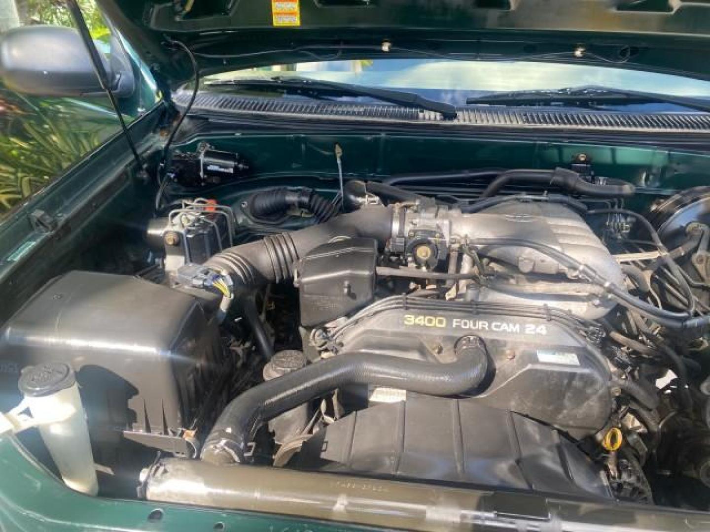 2003 Imperial Jade Mica /Oak Toyota Tundra LOW MILES 65,744 1 OWNER FL (5TBJN32173S) with an 3.4L DOHC EFI 24-Valve V6 Engine engine, Automatic transmission, located at 4701 North Dixie Hwy, Pompano Beach, FL, 33064, (954) 422-2889, 26.240938, -80.123474 - OUR WEBPAGE FLORIDACARS1.COM HAS OVER 100 PHOTOS AND FREE CARFAX LINK 2003 TOYOTA TUNDRA VIN: 5TBJN32173S387816 5 T B J N 3 2 1 7 3 S 3 8 7 8 1 6 PICKUP 3.4L V6 F DOHC 24V GASOLINE REAR WHEEL DRIVE Features ABS Brakes Air Conditioning AM/FM Stereo Automatic Transmission Bed Liner CD Audio Cloth Seat - Photo#24