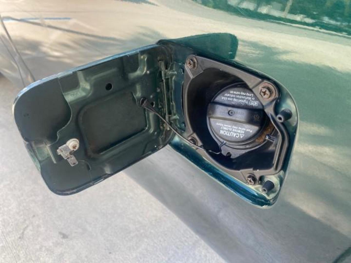 2003 Imperial Jade Mica /Oak Toyota Tundra LOW MILES 65,744 1 OWNER FL (5TBJN32173S) with an 3.4L DOHC EFI 24-Valve V6 Engine engine, Automatic transmission, located at 4701 North Dixie Hwy, Pompano Beach, FL, 33064, (954) 422-2889, 26.240938, -80.123474 - OUR WEBPAGE FLORIDACARS1.COM HAS OVER 100 PHOTOS AND FREE CARFAX LINK 2003 TOYOTA TUNDRA VIN: 5TBJN32173S387816 5 T B J N 3 2 1 7 3 S 3 8 7 8 1 6 PICKUP 3.4L V6 F DOHC 24V GASOLINE REAR WHEEL DRIVE Features ABS Brakes Air Conditioning AM/FM Stereo Automatic Transmission Bed Liner CD Audio Cloth Seat - Photo#67