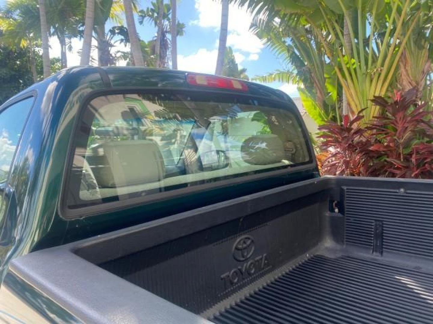 2003 Imperial Jade Mica /Oak Toyota Tundra LOW MILES 65,744 1 OWNER FL (5TBJN32173S) with an 3.4L DOHC EFI 24-Valve V6 Engine engine, Automatic transmission, located at 4701 North Dixie Hwy, Pompano Beach, FL, 33064, (954) 422-2889, 26.240938, -80.123474 - OUR WEBPAGE FLORIDACARS1.COM HAS OVER 100 PHOTOS AND FREE CARFAX LINK 2003 TOYOTA TUNDRA VIN: 5TBJN32173S387816 5 T B J N 3 2 1 7 3 S 3 8 7 8 1 6 PICKUP 3.4L V6 F DOHC 24V GASOLINE REAR WHEEL DRIVE Features ABS Brakes Air Conditioning AM/FM Stereo Automatic Transmission Bed Liner CD Audio Cloth Seat - Photo#73