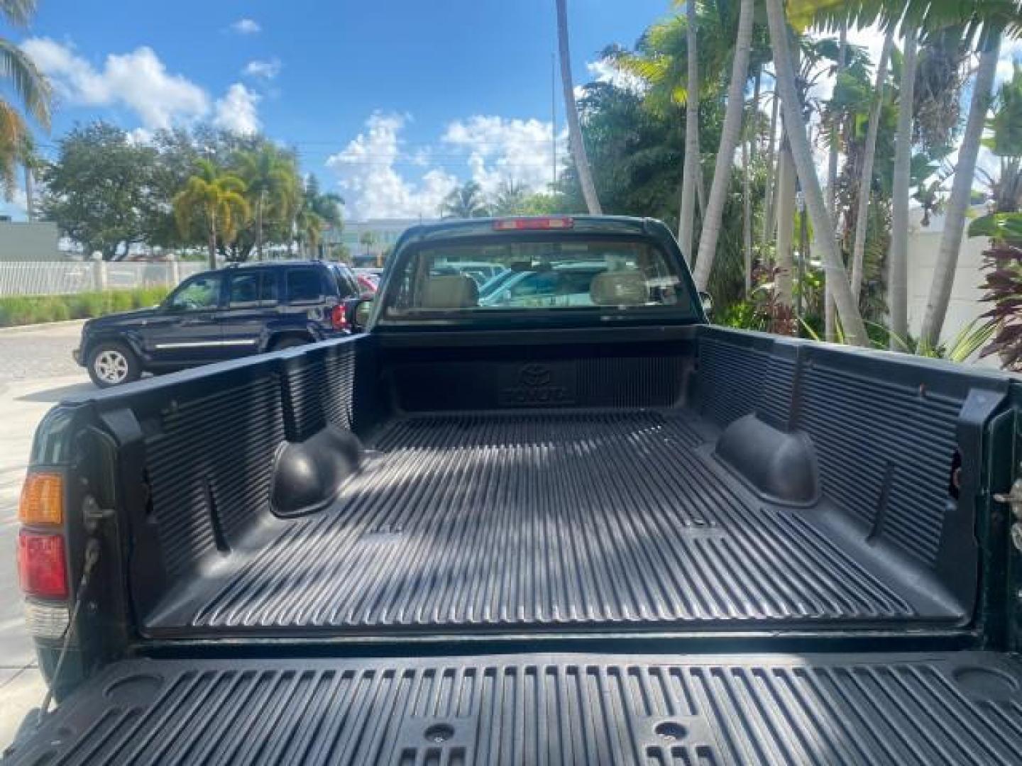 2003 Imperial Jade Mica /Oak Toyota Tundra LOW MILES 65,744 1 OWNER FL (5TBJN32173S) with an 3.4L DOHC EFI 24-Valve V6 Engine engine, Automatic transmission, located at 4701 North Dixie Hwy, Pompano Beach, FL, 33064, (954) 422-2889, 26.240938, -80.123474 - OUR WEBPAGE FLORIDACARS1.COM HAS OVER 100 PHOTOS AND FREE CARFAX LINK 2003 TOYOTA TUNDRA VIN: 5TBJN32173S387816 5 T B J N 3 2 1 7 3 S 3 8 7 8 1 6 PICKUP 3.4L V6 F DOHC 24V GASOLINE REAR WHEEL DRIVE Features ABS Brakes Air Conditioning AM/FM Stereo Automatic Transmission Bed Liner CD Audio Cloth Seat - Photo#83