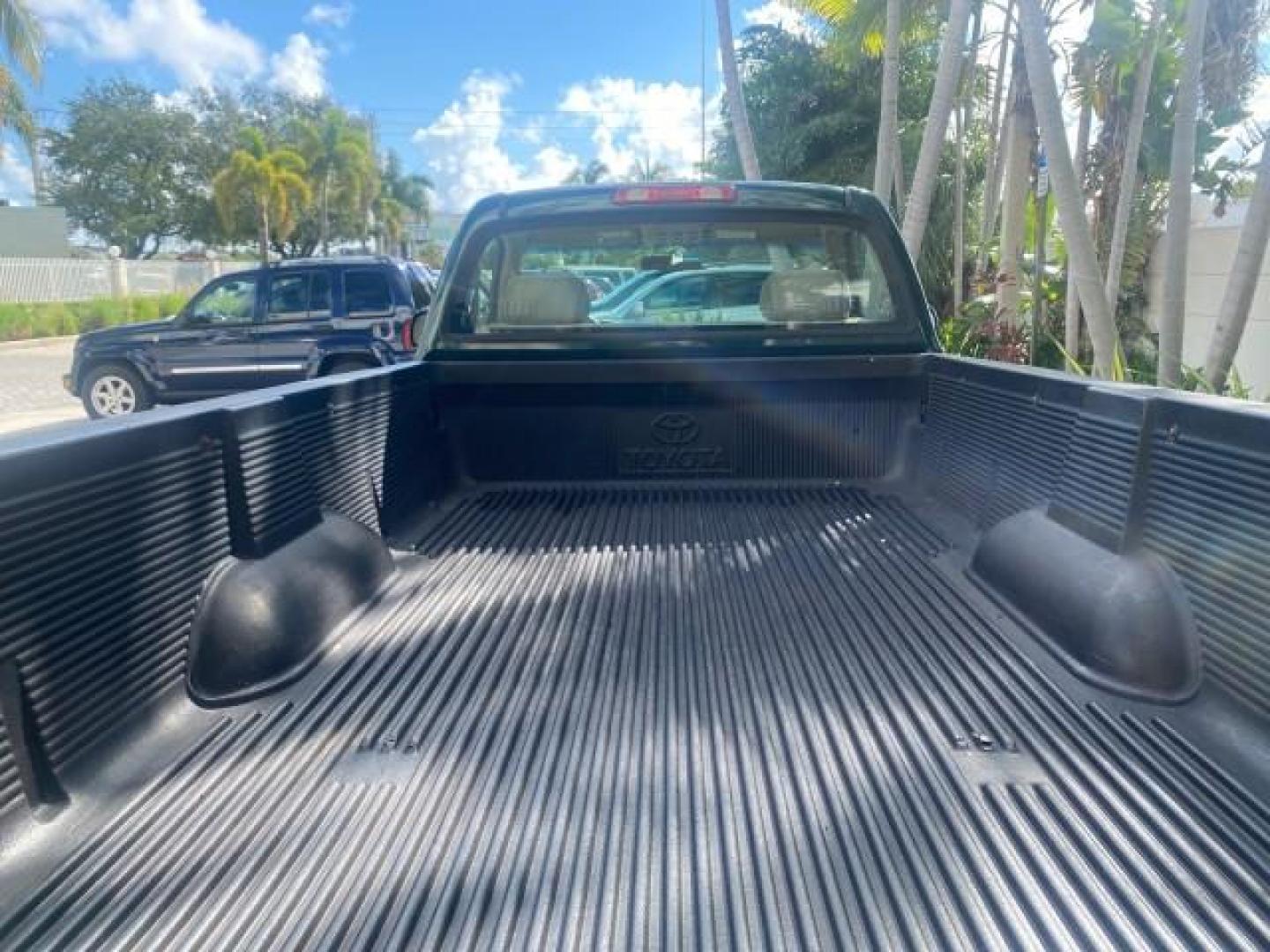 2003 Imperial Jade Mica /Oak Toyota Tundra LOW MILES 65,744 1 OWNER FL (5TBJN32173S) with an 3.4L DOHC EFI 24-Valve V6 Engine engine, Automatic transmission, located at 4701 North Dixie Hwy, Pompano Beach, FL, 33064, (954) 422-2889, 26.240938, -80.123474 - OUR WEBPAGE FLORIDACARS1.COM HAS OVER 100 PHOTOS AND FREE CARFAX LINK 2003 TOYOTA TUNDRA VIN: 5TBJN32173S387816 5 T B J N 3 2 1 7 3 S 3 8 7 8 1 6 PICKUP 3.4L V6 F DOHC 24V GASOLINE REAR WHEEL DRIVE Features ABS Brakes Air Conditioning AM/FM Stereo Automatic Transmission Bed Liner CD Audio Cloth Seat - Photo#84