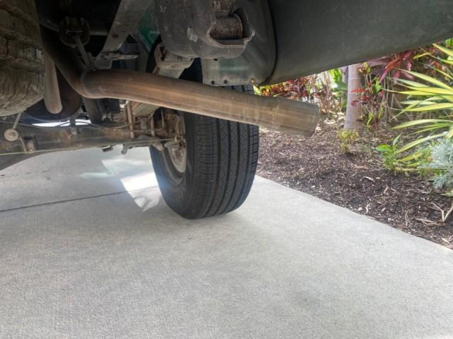 2003 Imperial Jade Mica /Oak Toyota Tundra LOW MILES 65,744 1 OWNER FL (5TBJN32173S) with an 3.4L DOHC EFI 24-Valve V6 Engine engine, Automatic transmission, located at 4701 North Dixie Hwy, Pompano Beach, FL, 33064, (954) 422-2889, 26.240938, -80.123474 - OUR WEBPAGE FLORIDACARS1.COM HAS OVER 100 PHOTOS AND FREE CARFAX LINK 2003 TOYOTA TUNDRA VIN: 5TBJN32173S387816 5 T B J N 3 2 1 7 3 S 3 8 7 8 1 6 PICKUP 3.4L V6 F DOHC 24V GASOLINE REAR WHEEL DRIVE Features ABS Brakes Air Conditioning AM/FM Stereo Automatic Transmission Bed Liner CD Audio Cloth Seat - Photo#86