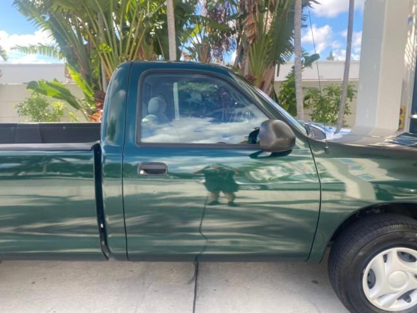 2003 Imperial Jade Mica /Oak Toyota Tundra LOW MILES 65,744 1 OWNER FL (5TBJN32173S) with an 3.4L DOHC EFI 24-Valve V6 Engine engine, Automatic transmission, located at 4701 North Dixie Hwy, Pompano Beach, FL, 33064, (954) 422-2889, 26.240938, -80.123474 - OUR WEBPAGE FLORIDACARS1.COM HAS OVER 100 PHOTOS AND FREE CARFAX LINK 2003 TOYOTA TUNDRA VIN: 5TBJN32173S387816 5 T B J N 3 2 1 7 3 S 3 8 7 8 1 6 PICKUP 3.4L V6 F DOHC 24V GASOLINE REAR WHEEL DRIVE Features ABS Brakes Air Conditioning AM/FM Stereo Automatic Transmission Bed Liner CD Audio Cloth Seat - Photo#99