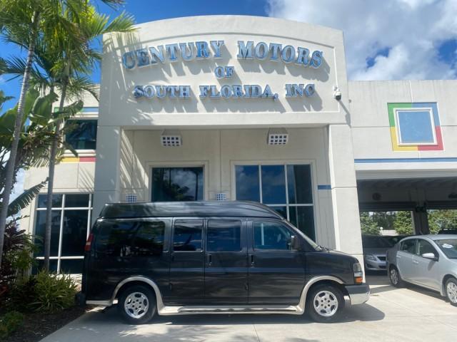 2004 Black /Medium Dark Pewter Chevrolet Express HANDICAP LIFT 1 OWNER FLORIDA HIGH TOP CONV VAN (1GBFG15T441) with an 5.3L Vortec 5300 V8 SFI Engine engine, Automatic transmission, located at 4701 North Dixie Hwy, Pompano Beach, FL, 33064, (954) 422-2889, 26.240938, -80.123474 - OUR WEBPAGE FLORIDACARS1.COM HAS OVER 100 PHOTOS AND FREE CARFAX LINK 2004 CHEVROLET EXPRESS G1500 HIGH TOP CONVERSION VAN WITH HANDICAP RAMP/LIFT VIN: 1GBFG15T441124744 THIS VAN COSTS $85,000 BRAND NEW WITH THE HANDICAP RAMP 1 G B F G 1 5 T 4 4 1 1 2 4 7 4 4 VAN 5.3L V8 F GASOLINE REAR WHEEL DRIVE - Photo#0